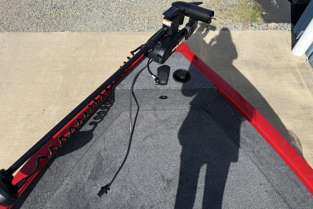 2026 Tracker Pro Guide V-16 SC boat deck with trolling motor and shadow.