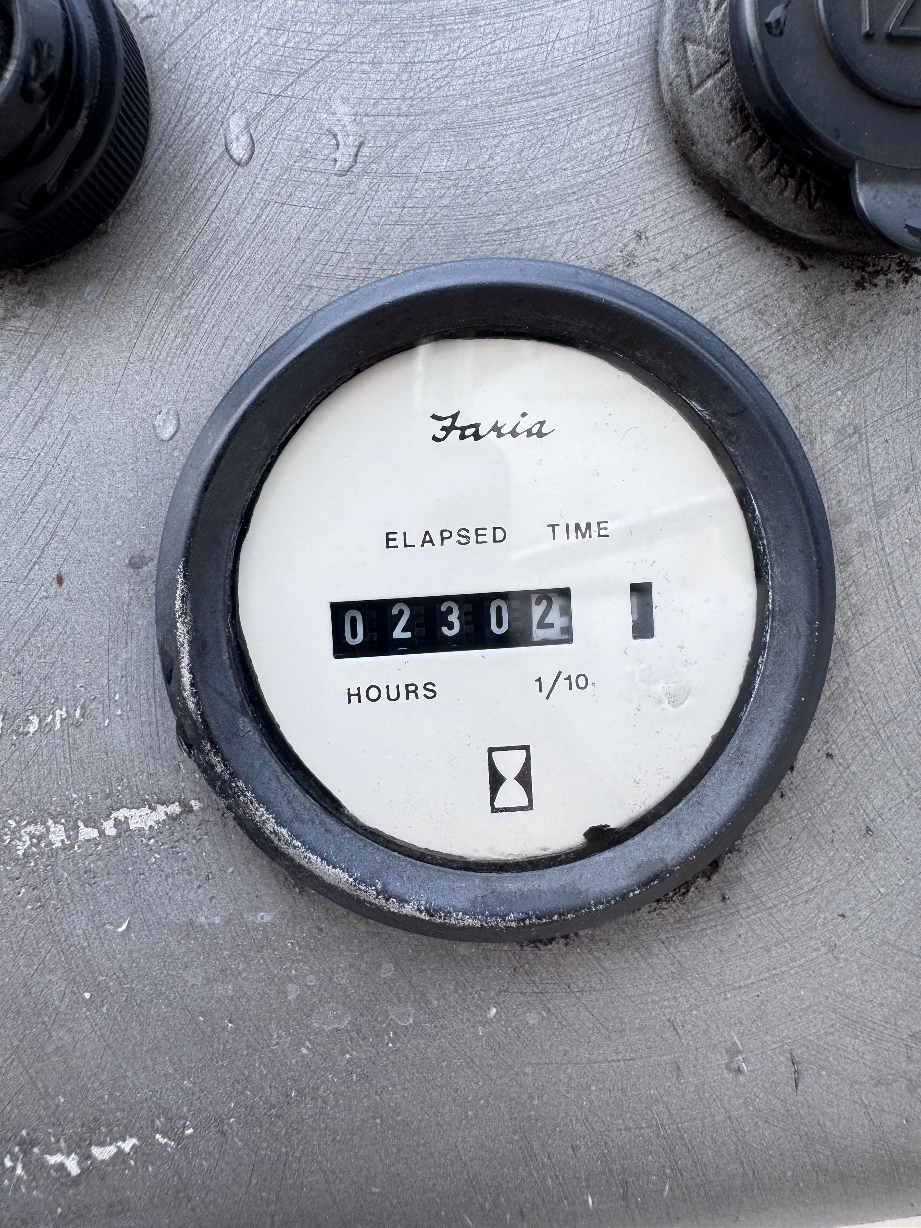 Faria hour meter on 2005 Bayliner Trophy, displaying 2302.1 hours.