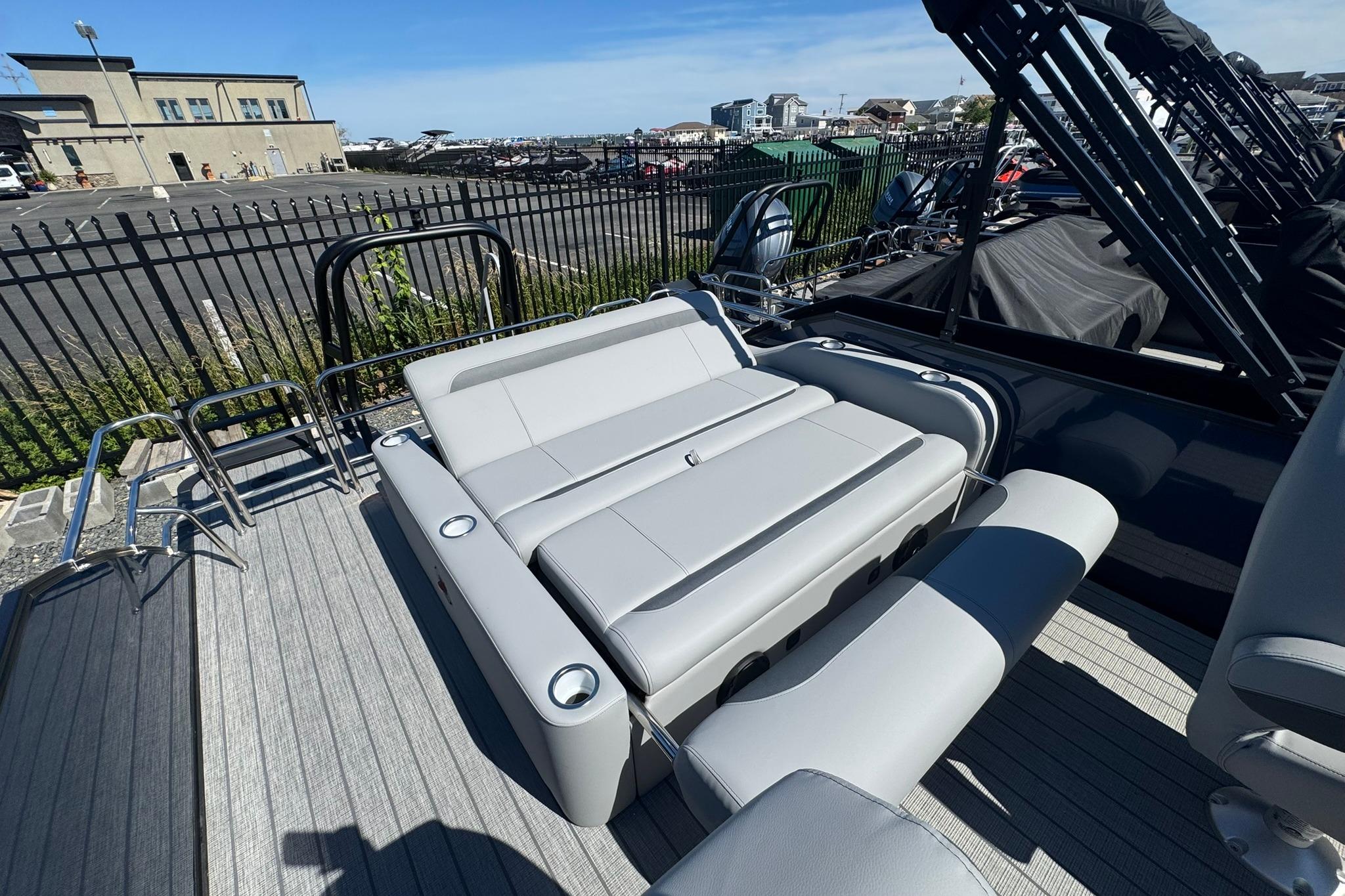 2026 Bentley Pontoons Legacy 243 Swingback with luxurious seating and sleek design.