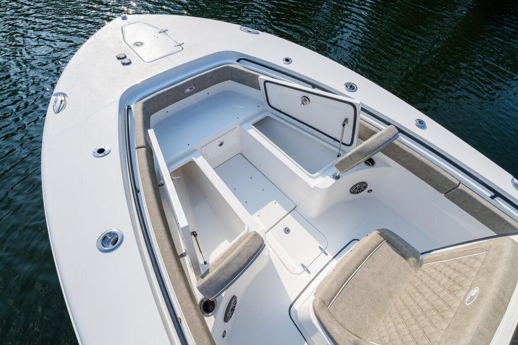 Manufacturer Provided Image: 2026 Sea Hunt Gamefish 25 boat interior with open storage compartments and cushioned seating.