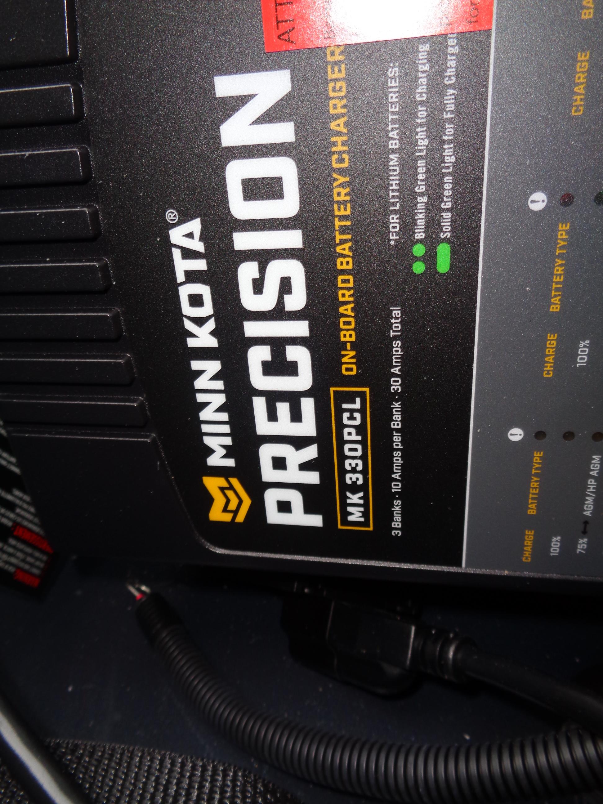 Minn Kota Precision MK 330PCL on-board battery charger in 2024 Lund 1650 Rebel XL Sport.