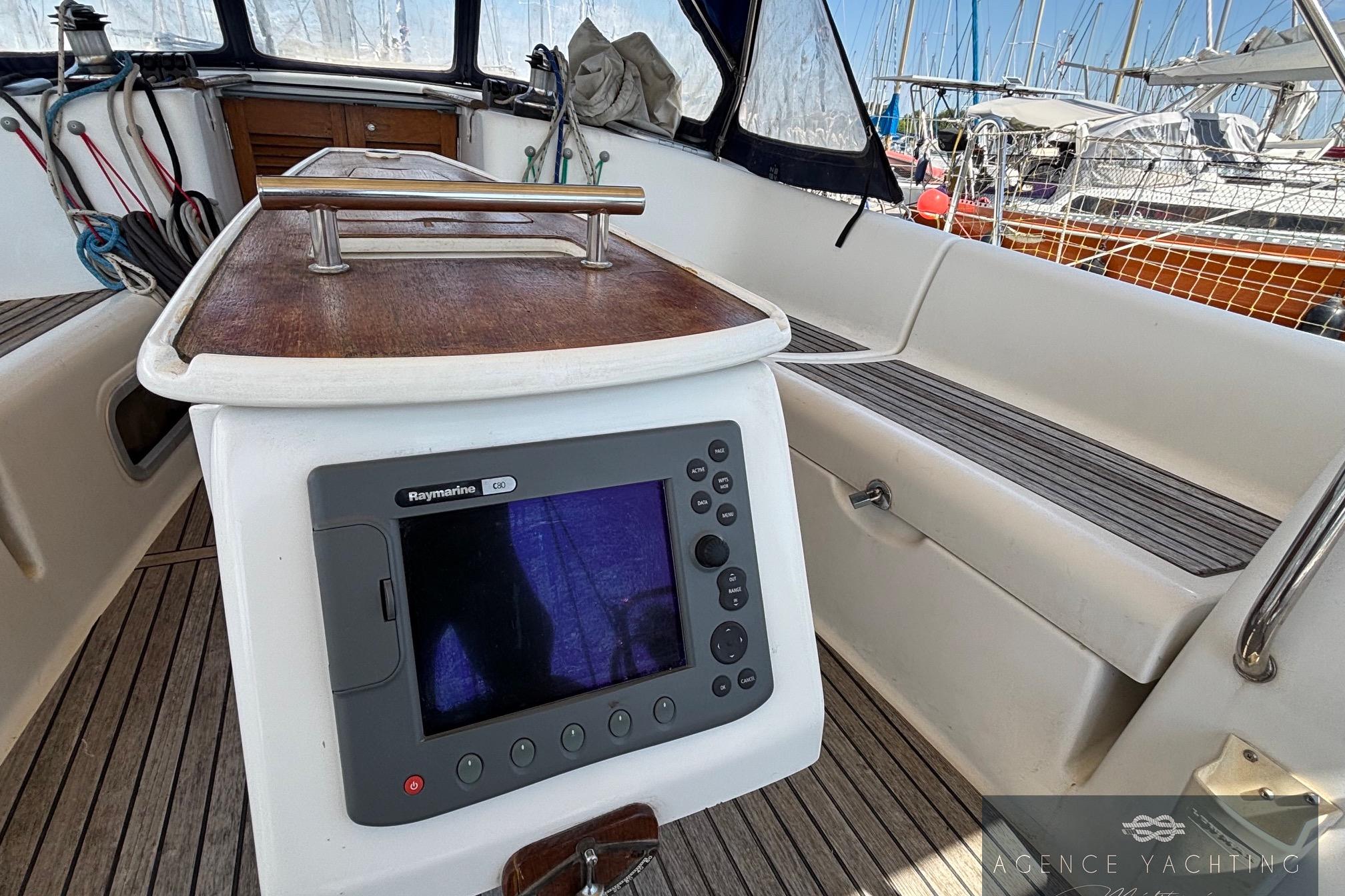 Cockpit of 2008 Beneteau Oceanis 40 sailboat with Raymarine navigation system.
