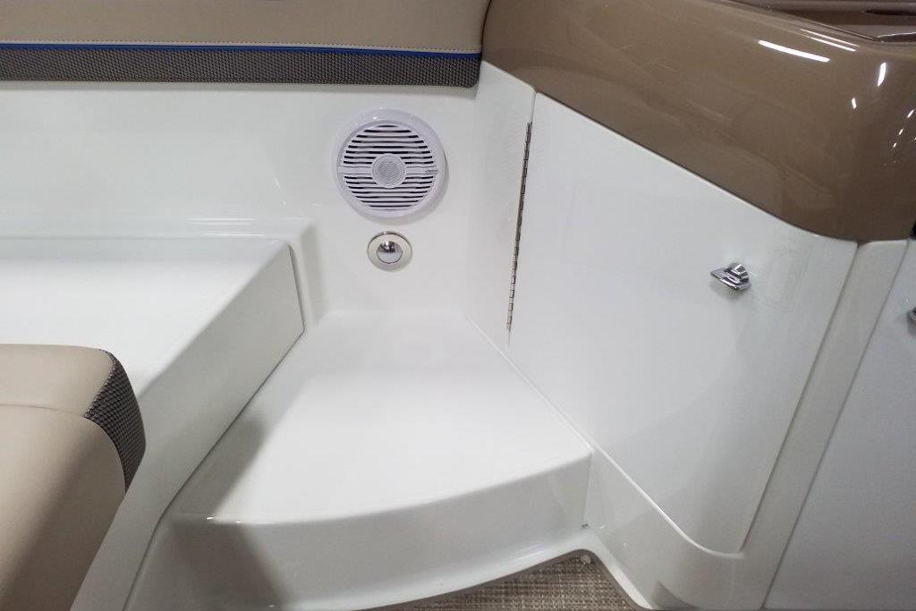 Interior of 2019 Formula 310 Bowrider boat, featuring seating and speaker.
