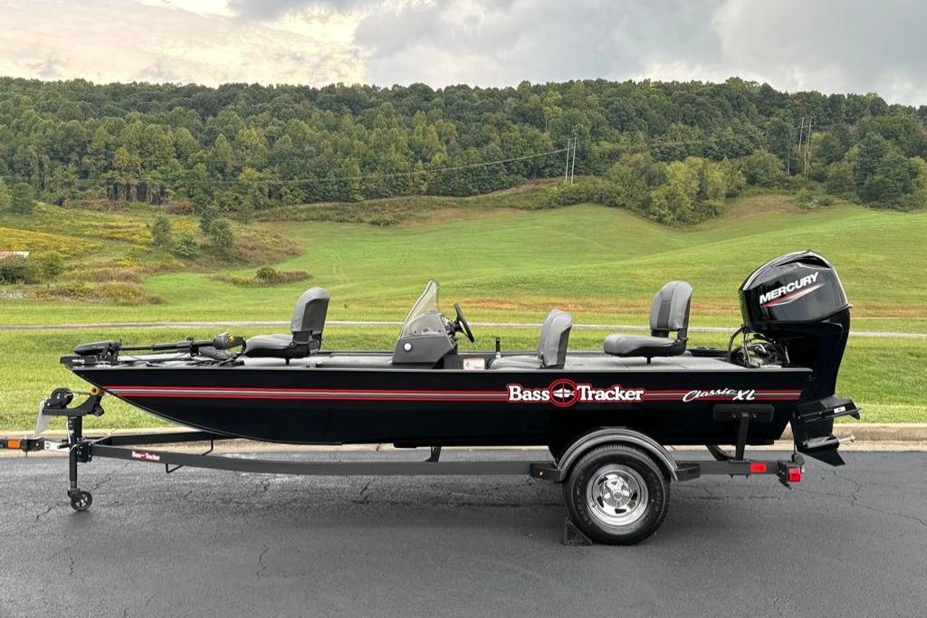 2026 Tracker Bass Tracker Classic XL boat on trailer, scenic background.