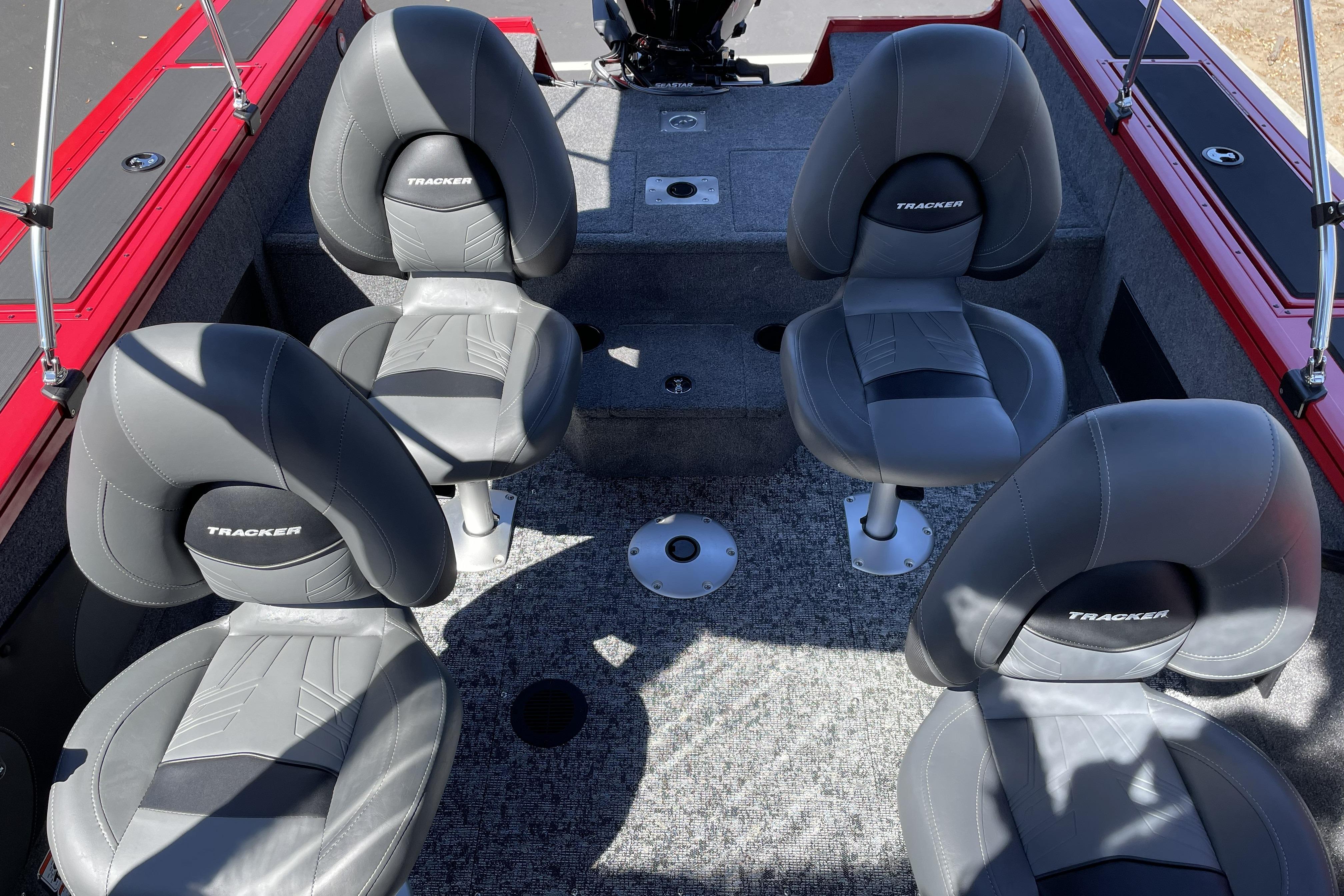 2026 Tracker Targa V-18 WT boat interior with four gray cushioned seats.