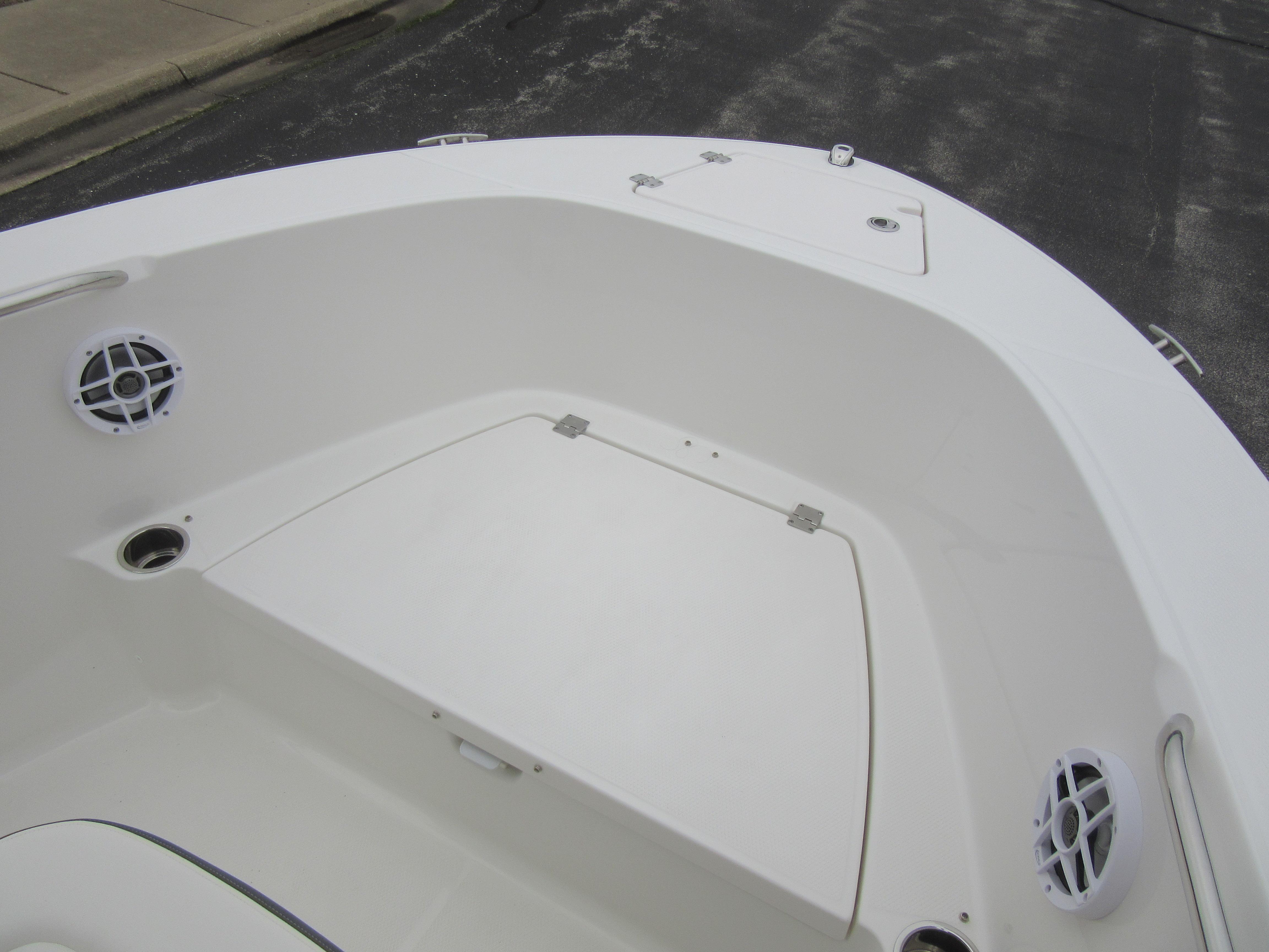 2024 Robalo R180 Center Console boat bow with storage compartments and speakers.