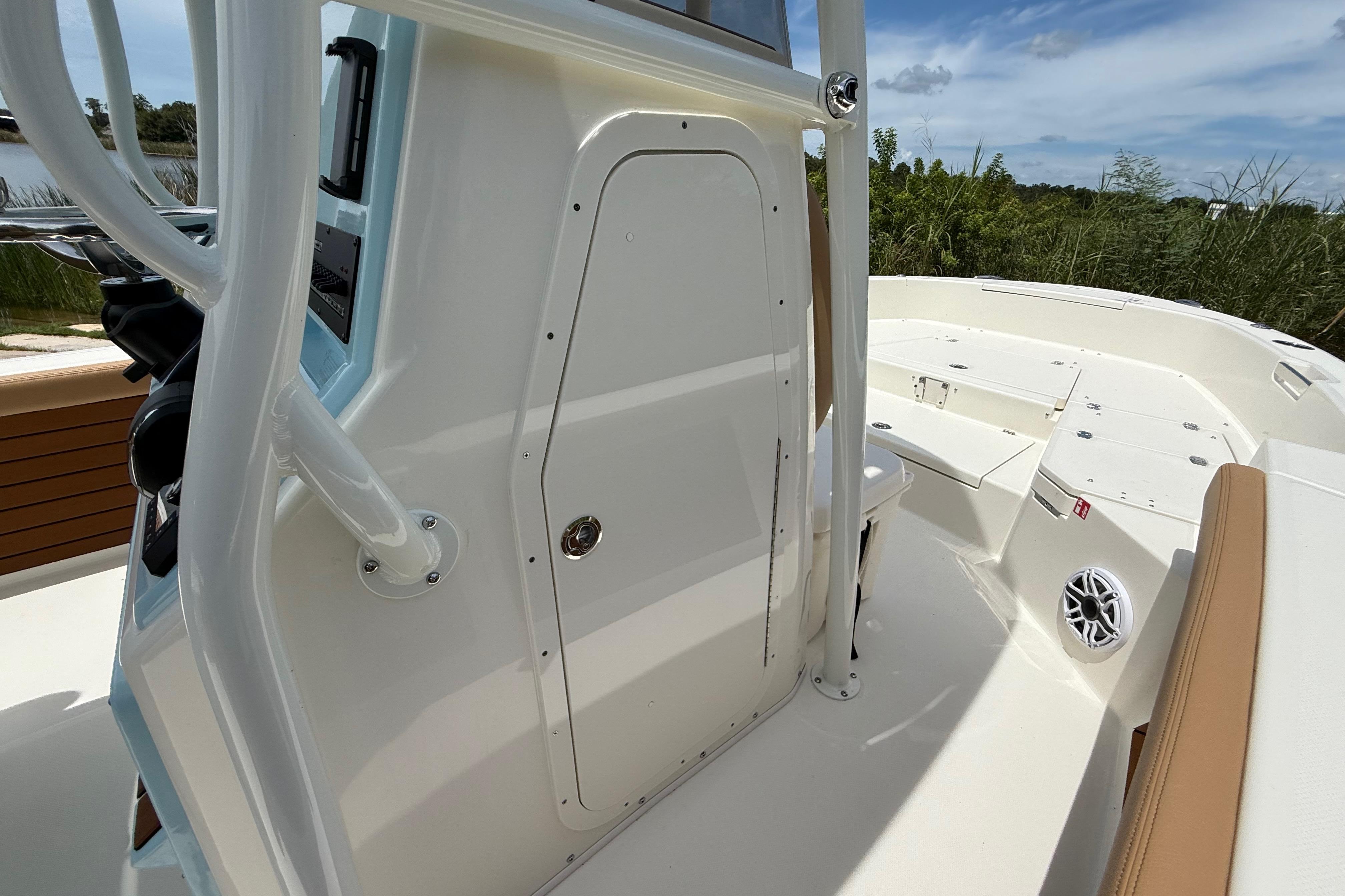 2026 Pathfinder 2400 TRS boat interior with console and seating area.