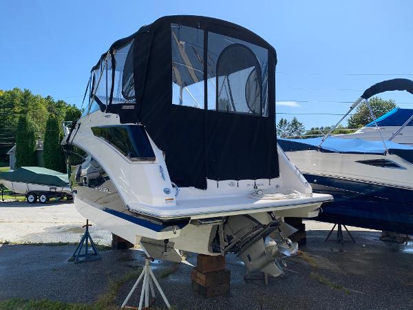 A 2017 Regal 26 Express boat is on a stand on land.