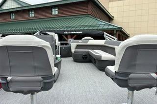 2026 Sun Tracker Bass Buggy 18 DLX pontoon boat with spacious seating and modern design.