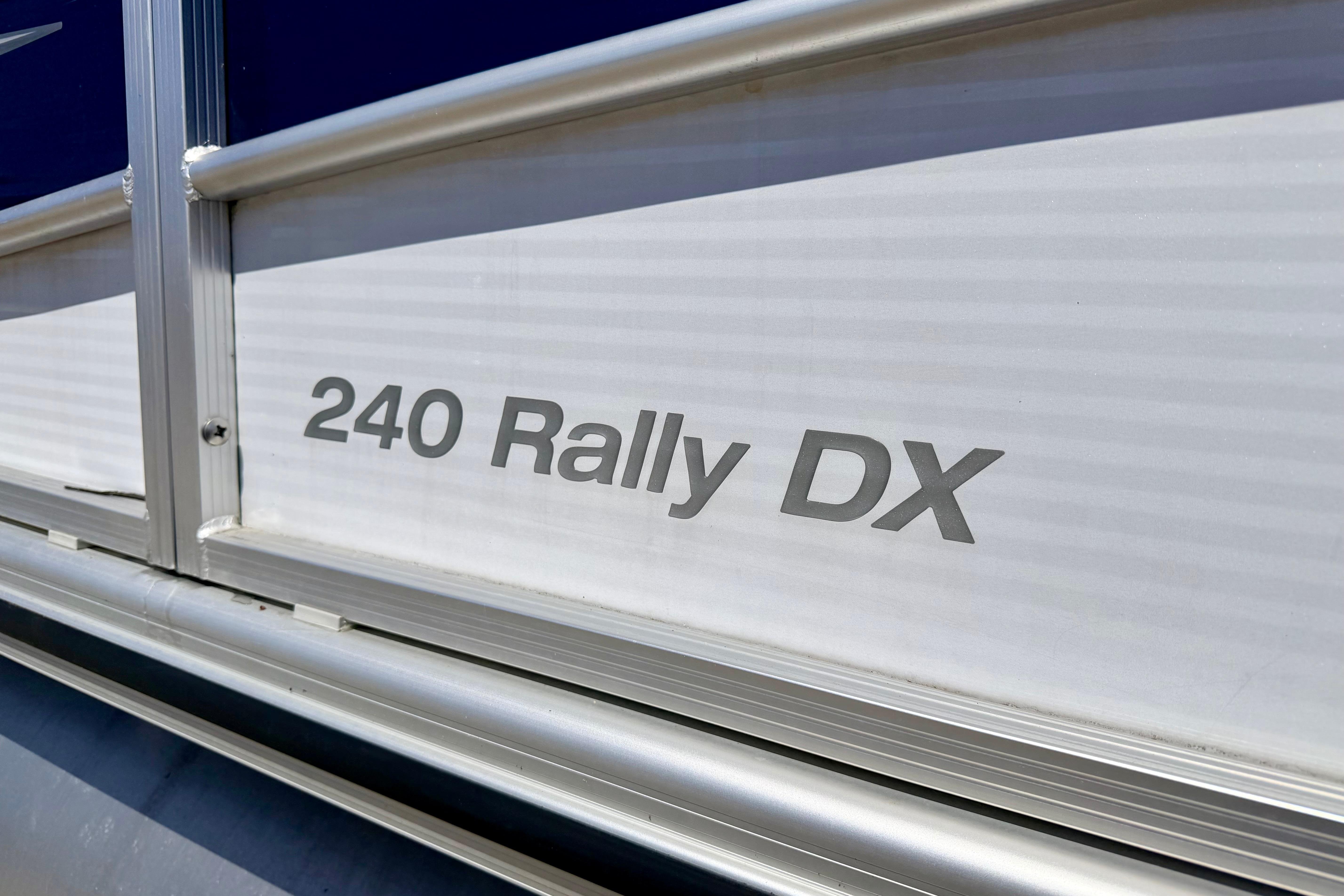 2019 Crestliner 240 Rally DX CW boat nameplate on aluminum siding.