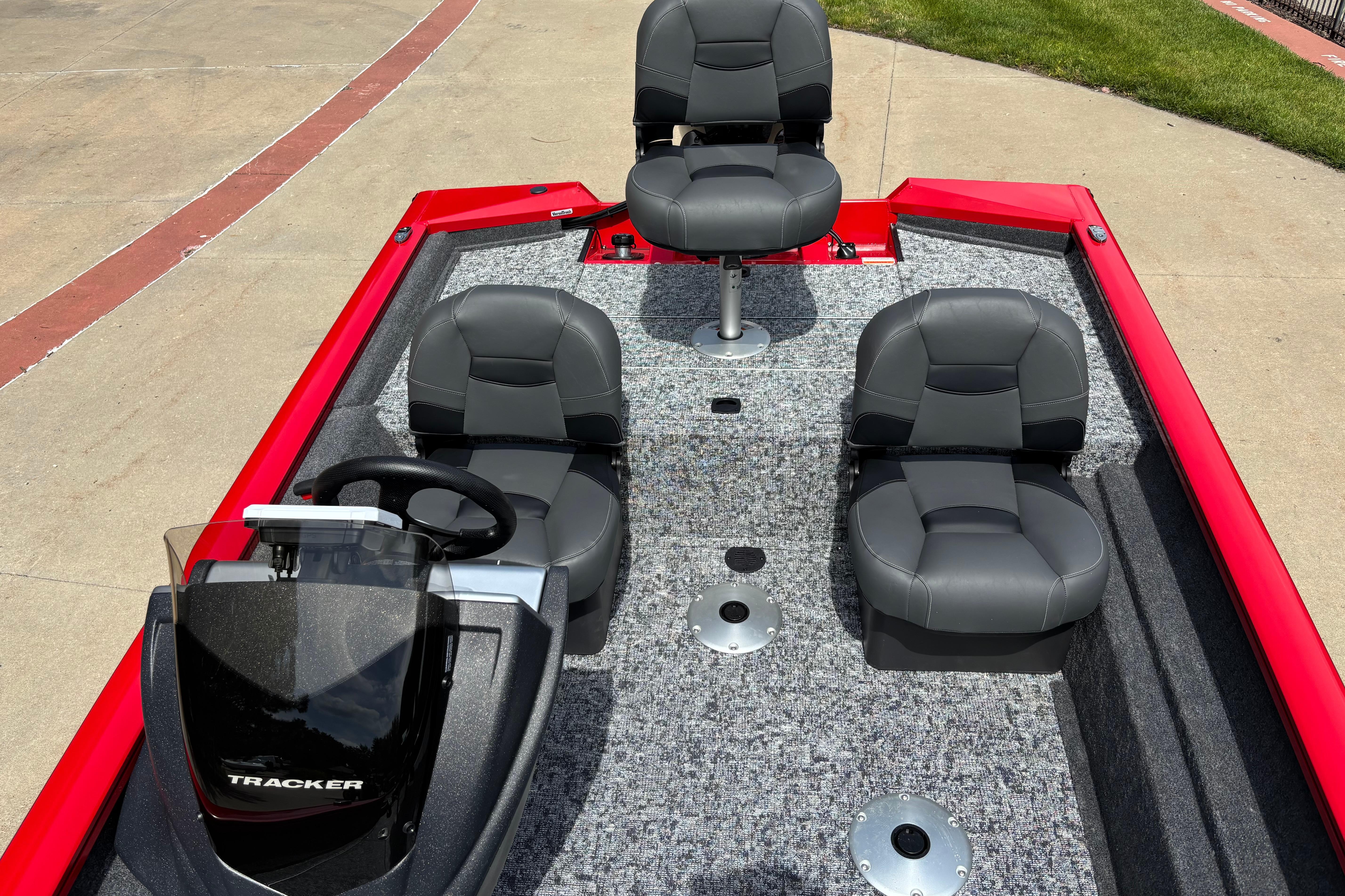 2026 Tracker Pro Team 175 Crappie Edition boat with gray seating and red accents.