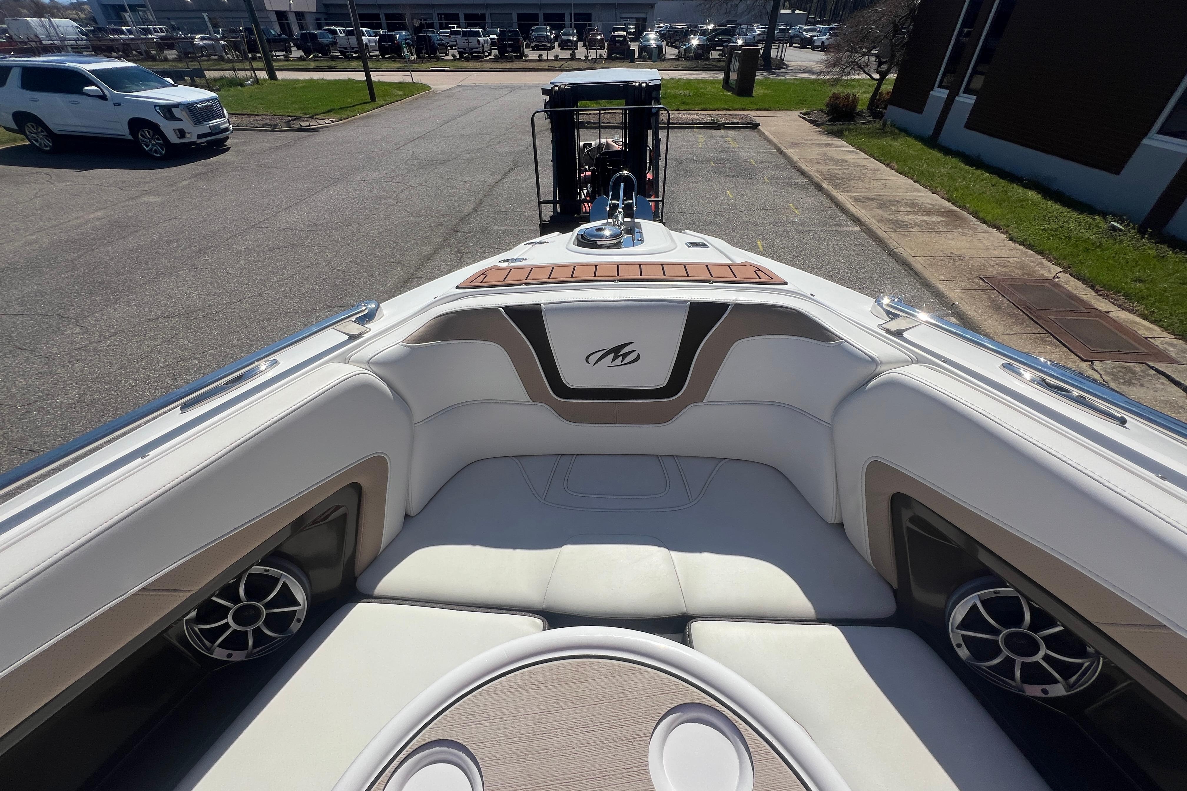 2017 Monterey 298SS Super Sport boat interior with white seating and speakers.