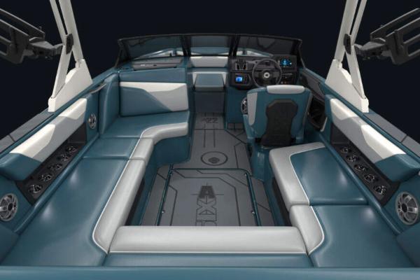 Manufacturer Provided Image: 2022 Axis A22 boat interior with blue and white seating, modern dashboard, and spacious layout.