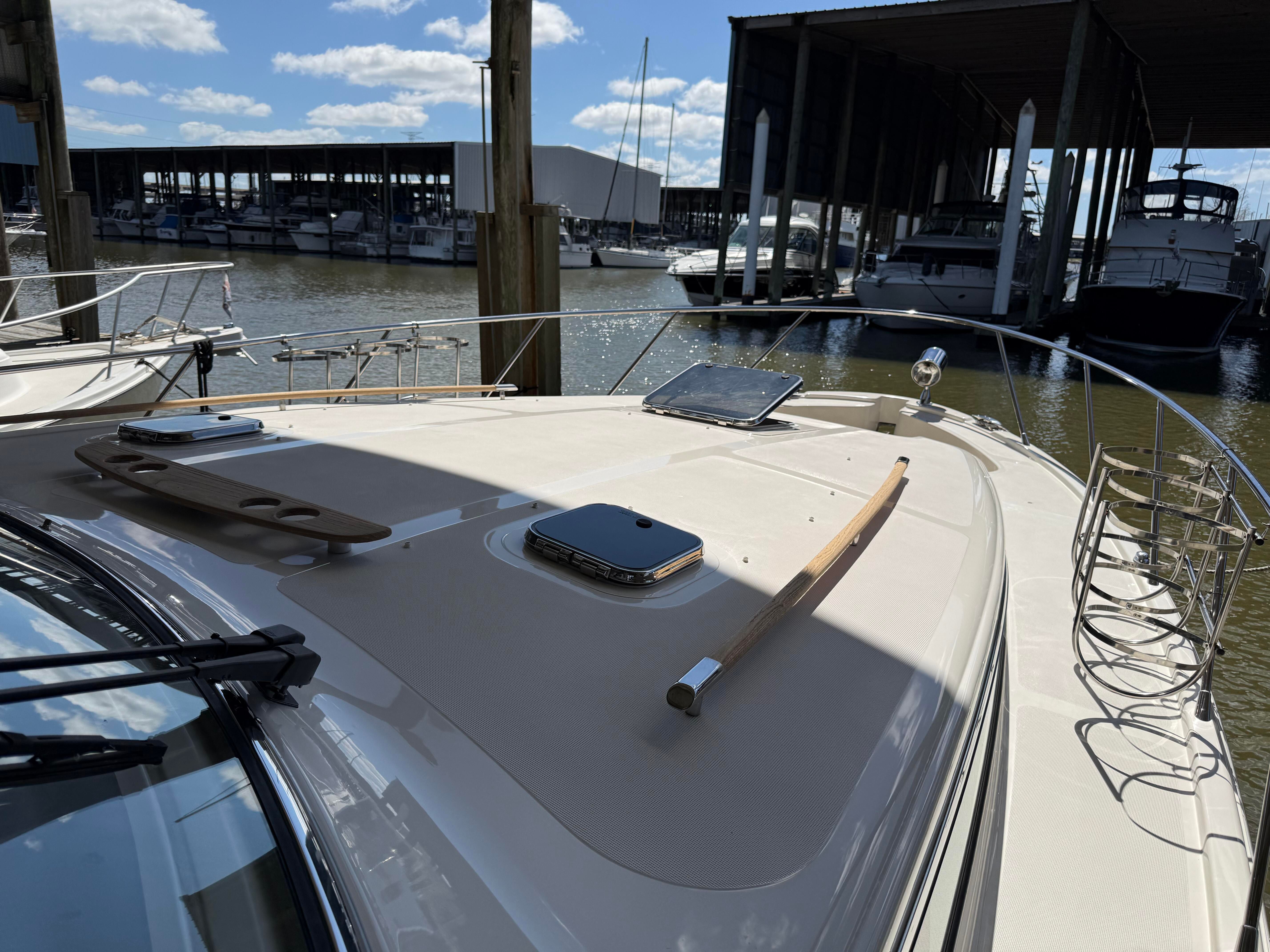 Deck of a Chris-Craft Roamer 40 with a clear view of the marina.