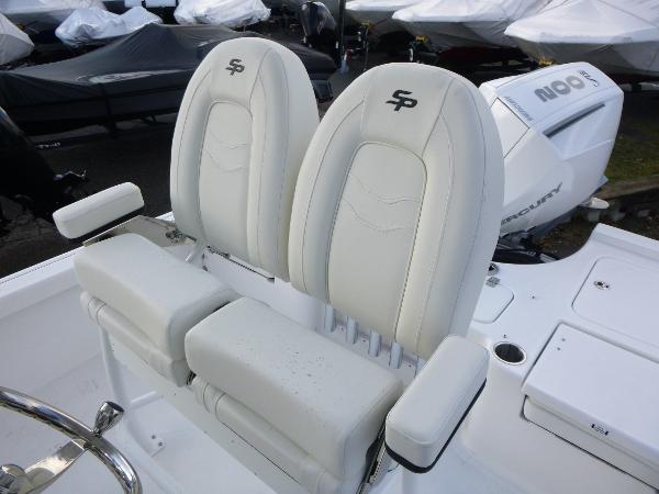 2025 Sea Pro 230 Bay boat seats with white upholstery and SP logo.