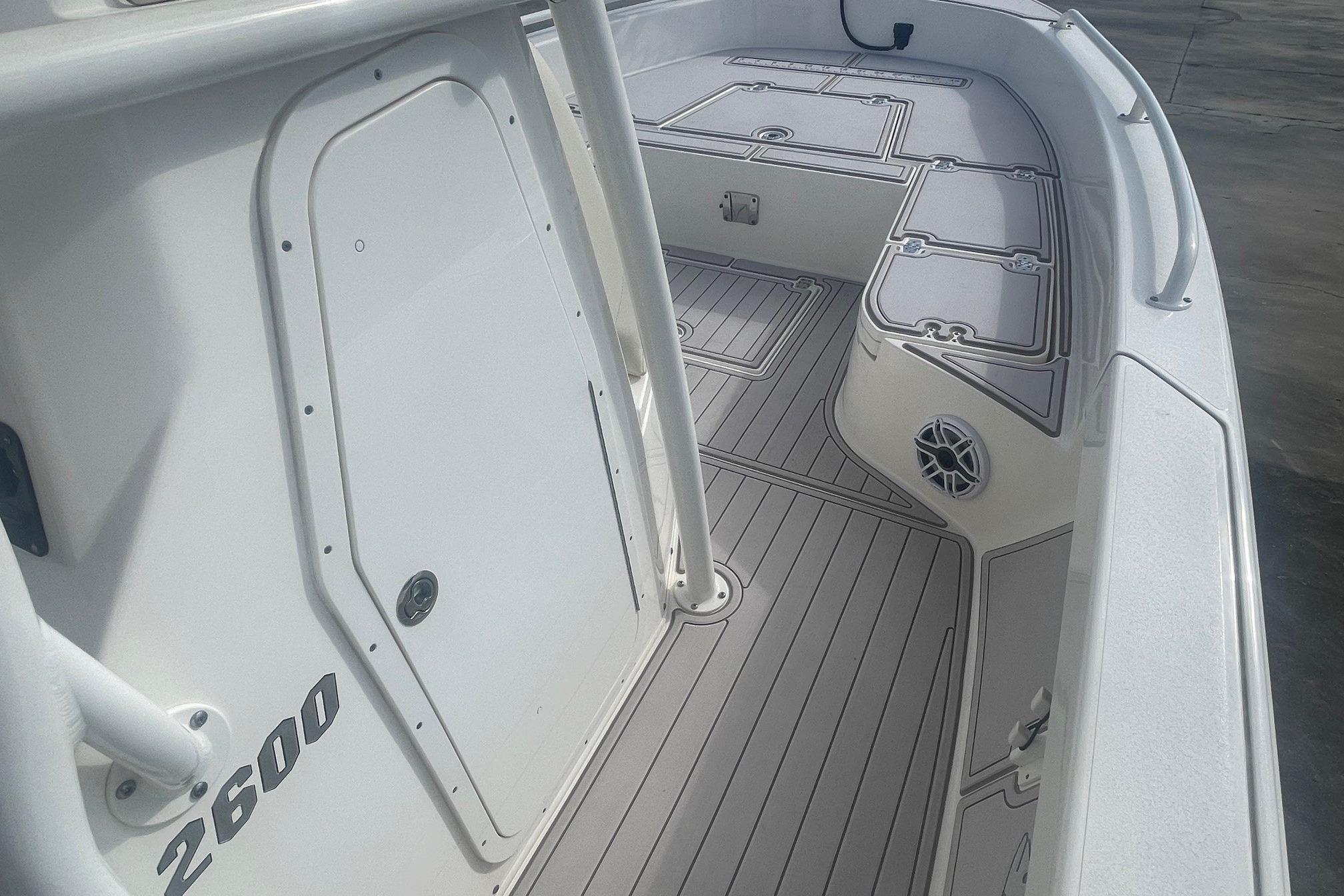 2022 Pathfinder 2600 TRS boat interior with sleek deck design and storage compartments.