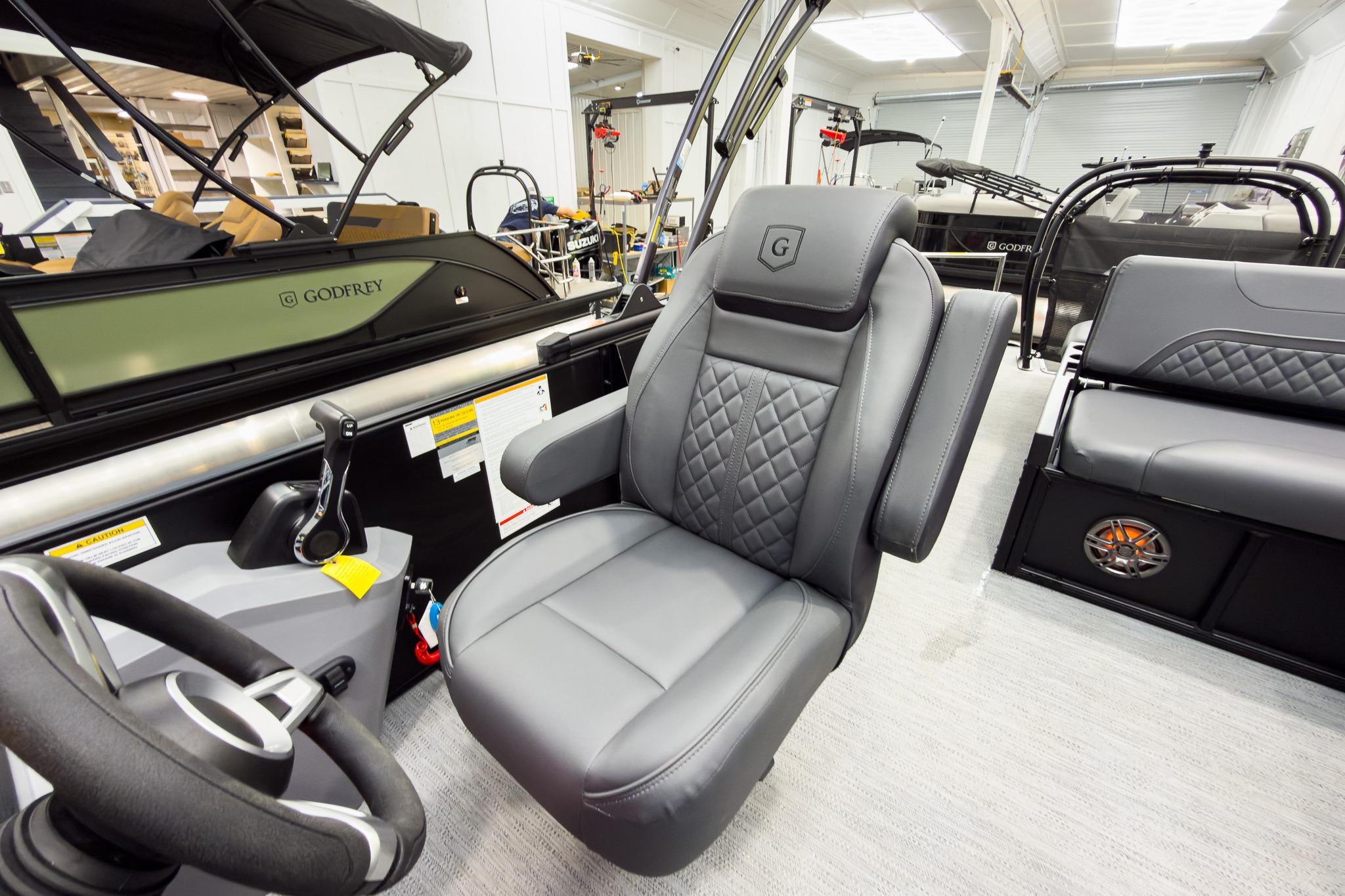 2026 Godfrey Sweetwater 22' Tritoon interior with luxurious seating and modern design.