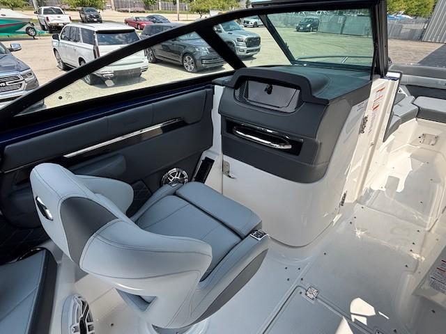 2026 Chaparral SSX 6 boat interior with modern seating and dashboard design.