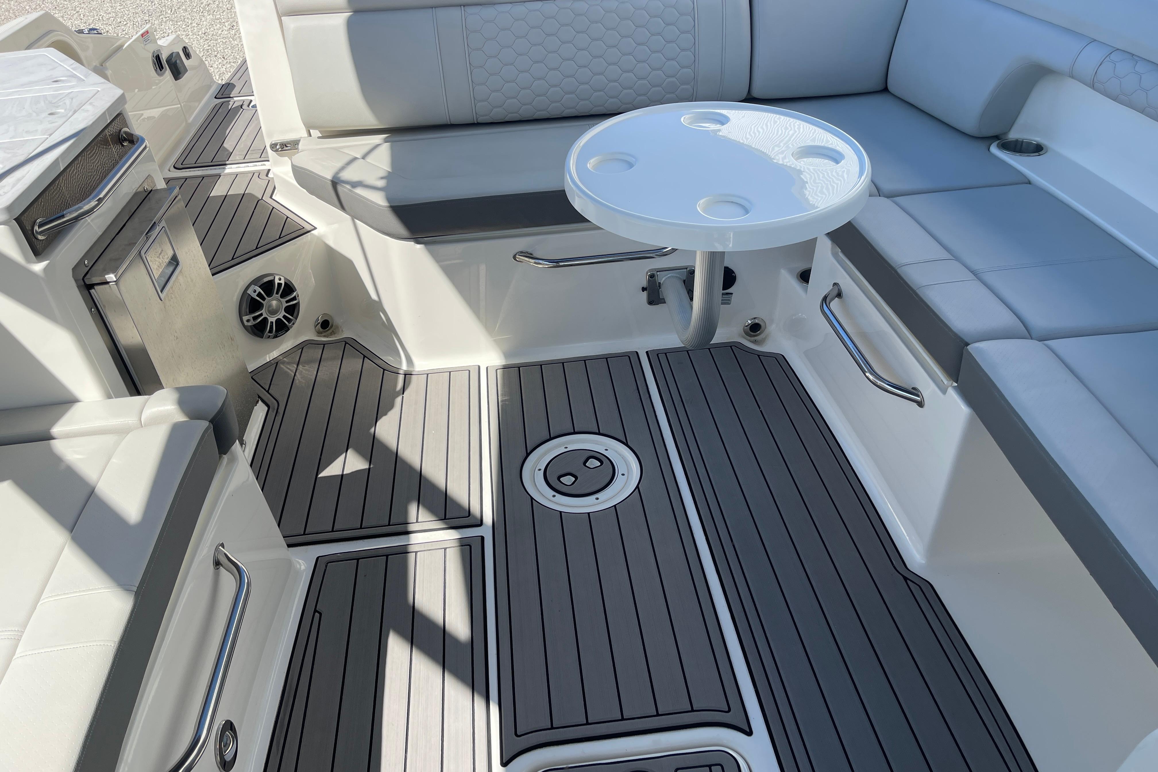 2023 Sea Ray SDX 290 Outboard boat interior with seating and table.