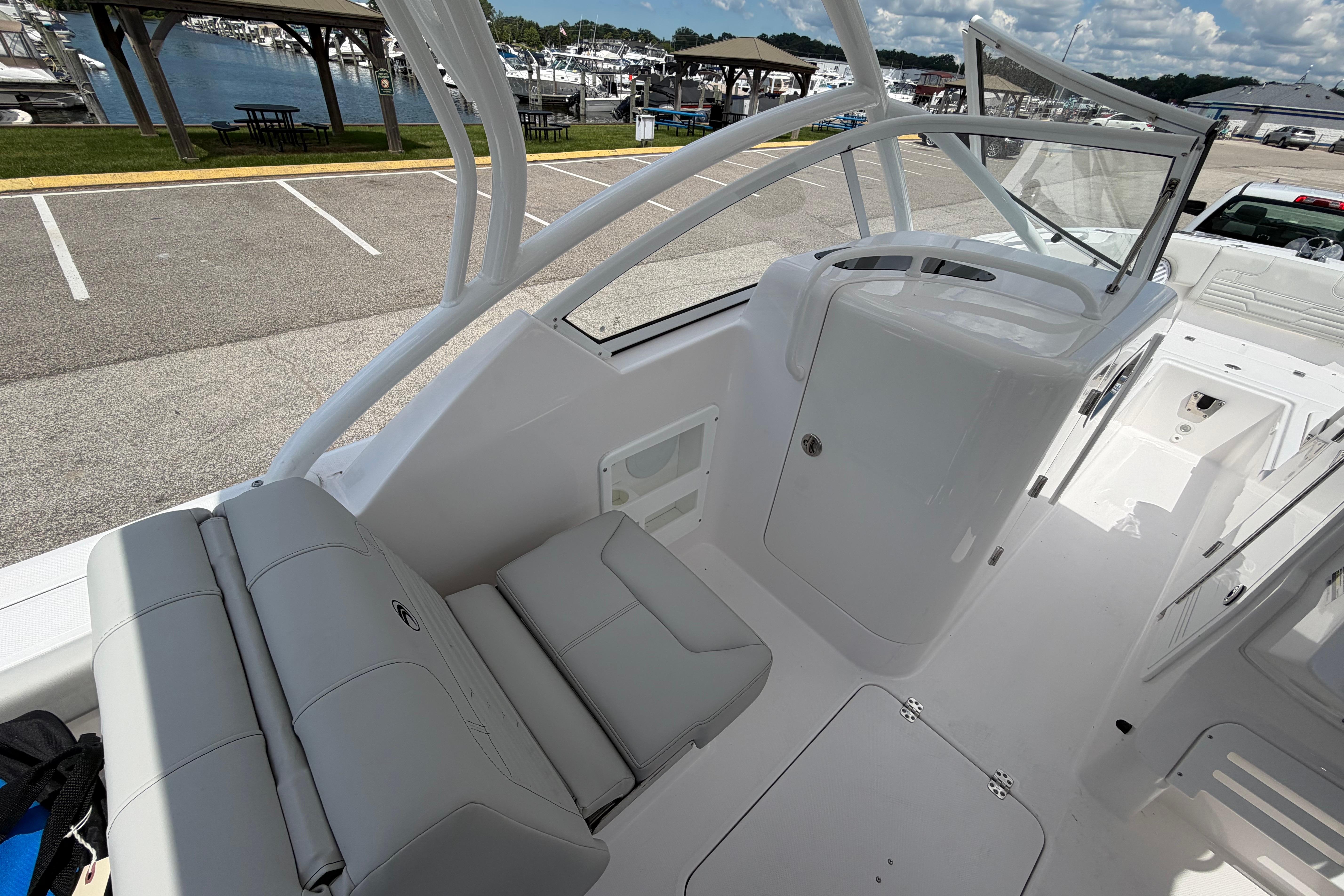2026 Edgewater 248CX Crossover boat interior with sleek seating and modern design.