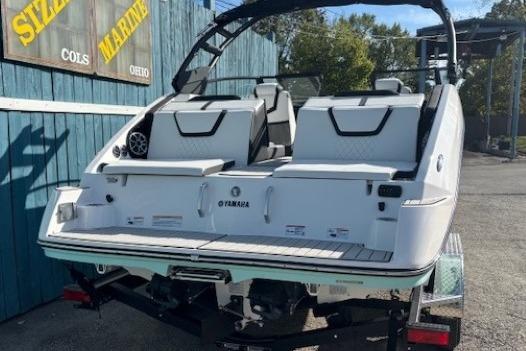 2026 Yamaha Boats 222S, rear view, on trailer, outdoor setting.