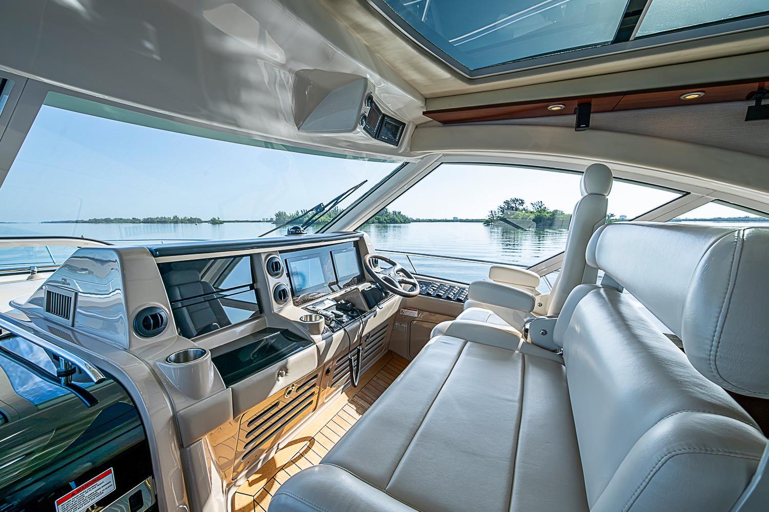 Luxurious interior of 2008 Sea Ray 60 Sundancer yacht with panoramic water views.