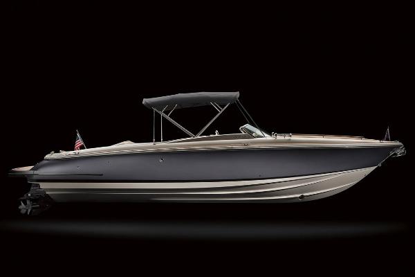 2021 Chris-Craft Corsair 34 boat, side view, black background.