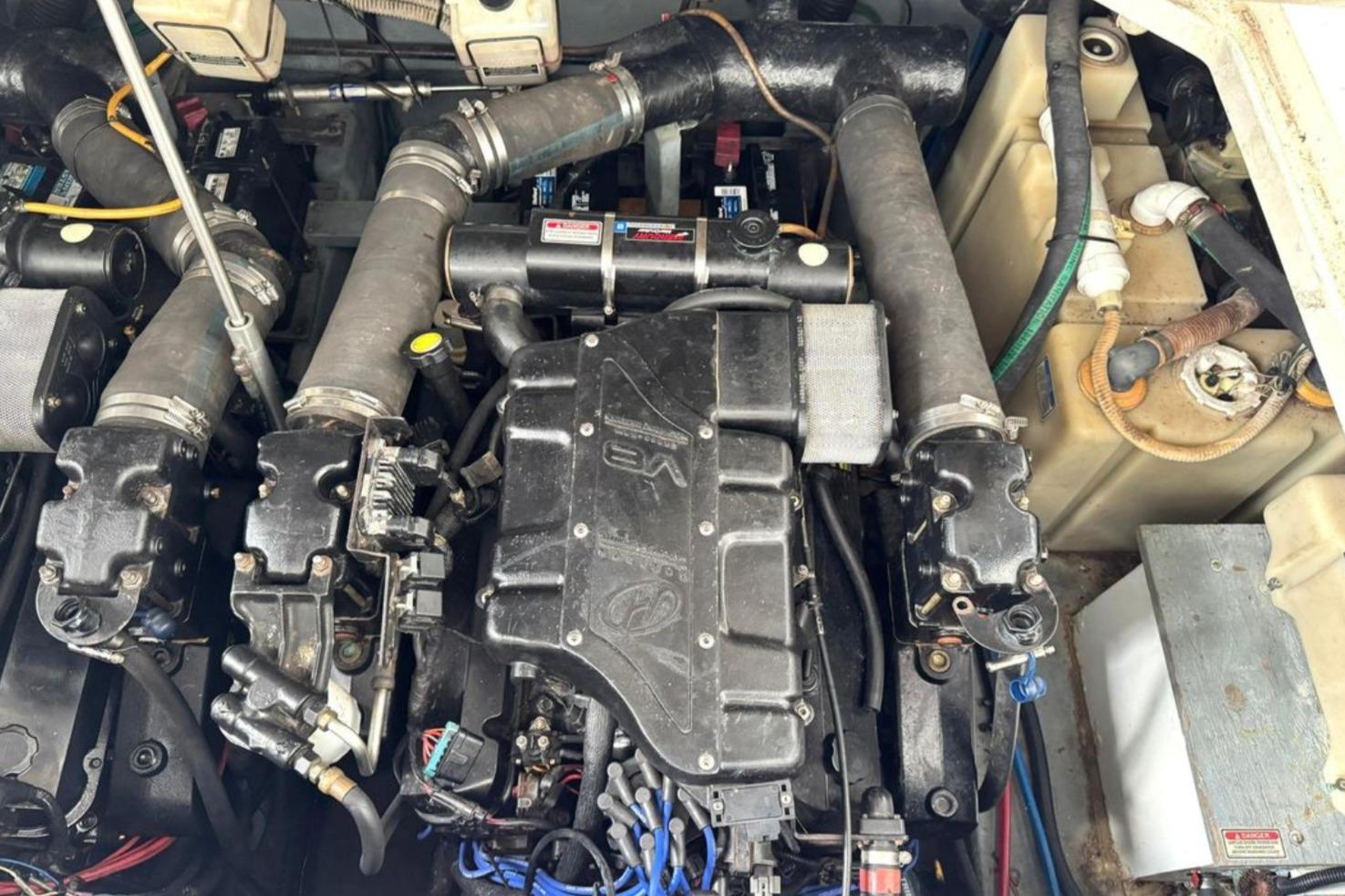Engine compartment of a 2000 Sea Ray 340 Sundancer boat, showing detailed components.