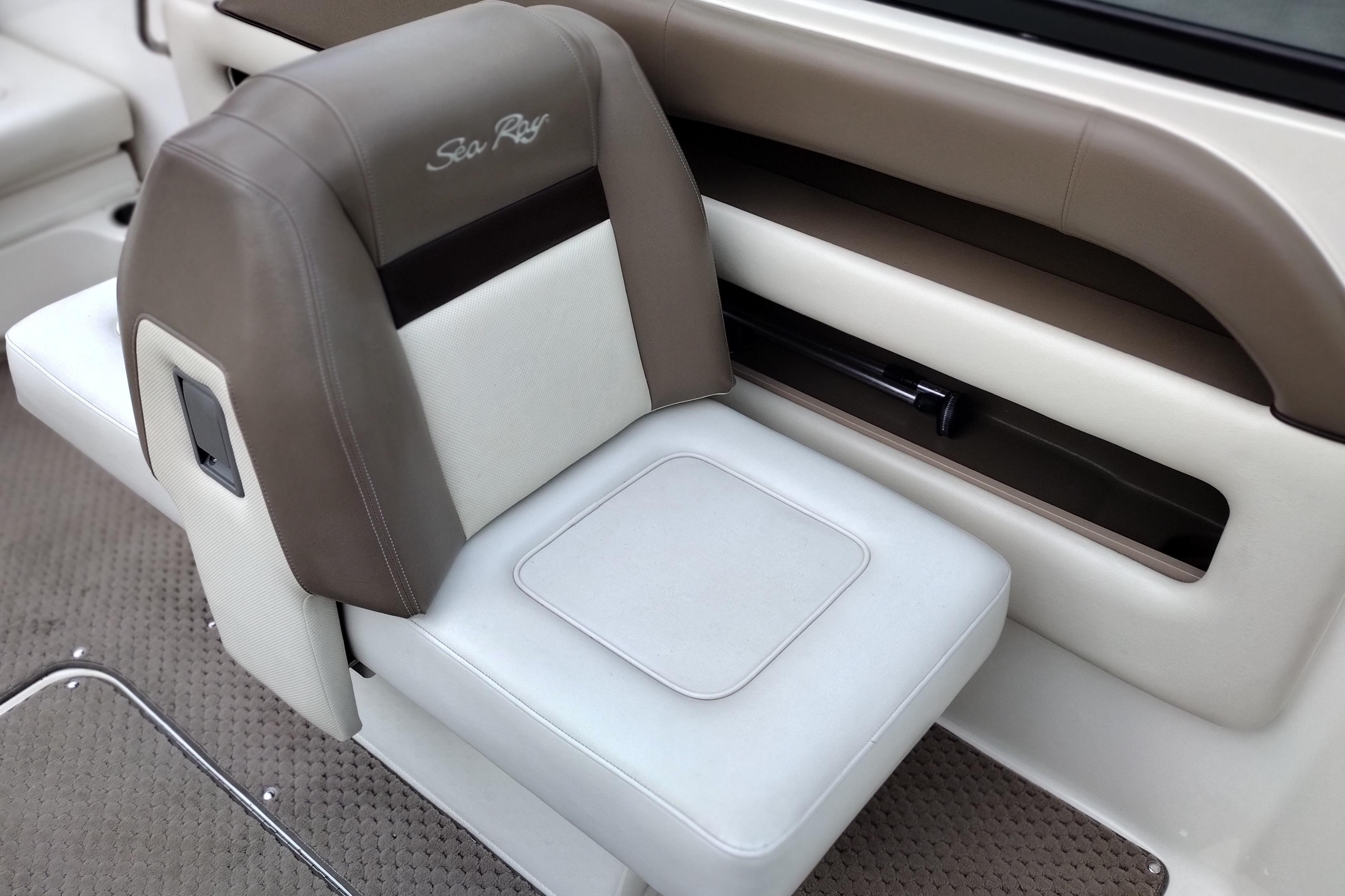 2013 Sea Ray 300 SLX boat seat with beige and white upholstery.