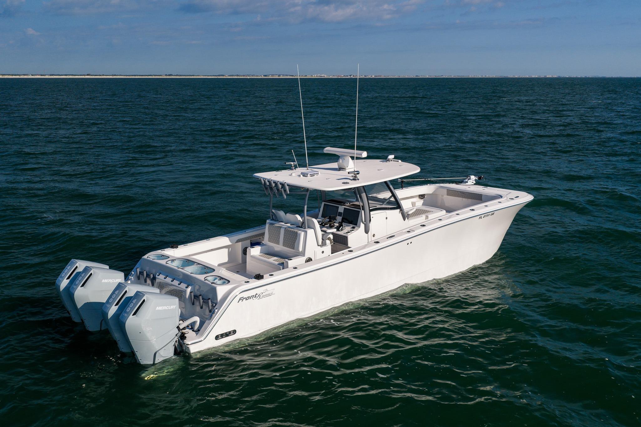 2026 Front Runner 37 Catamaran cruising on open water under clear skies.