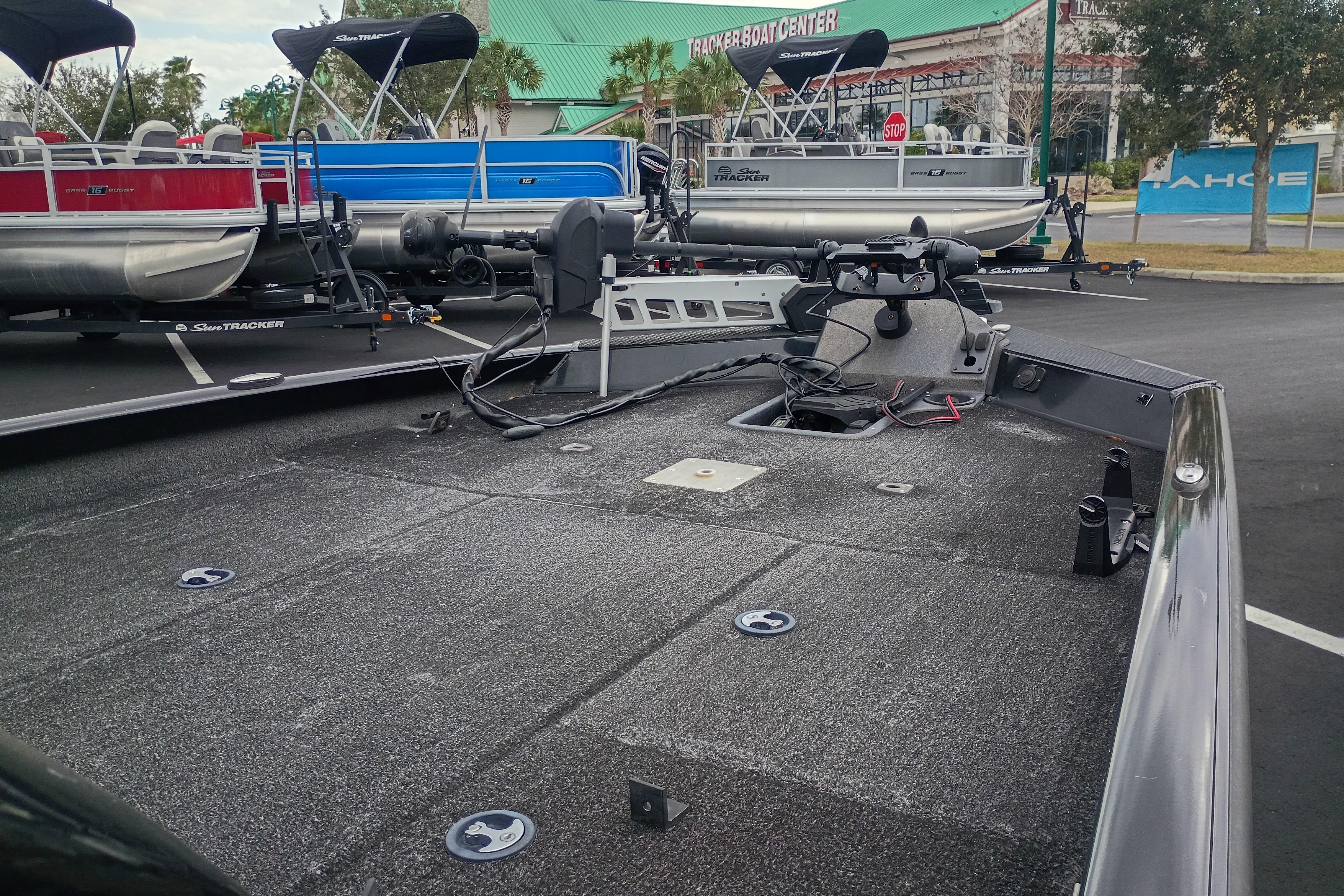 2021 Ranger RT198P boat deck in parking lot with other boats in background.