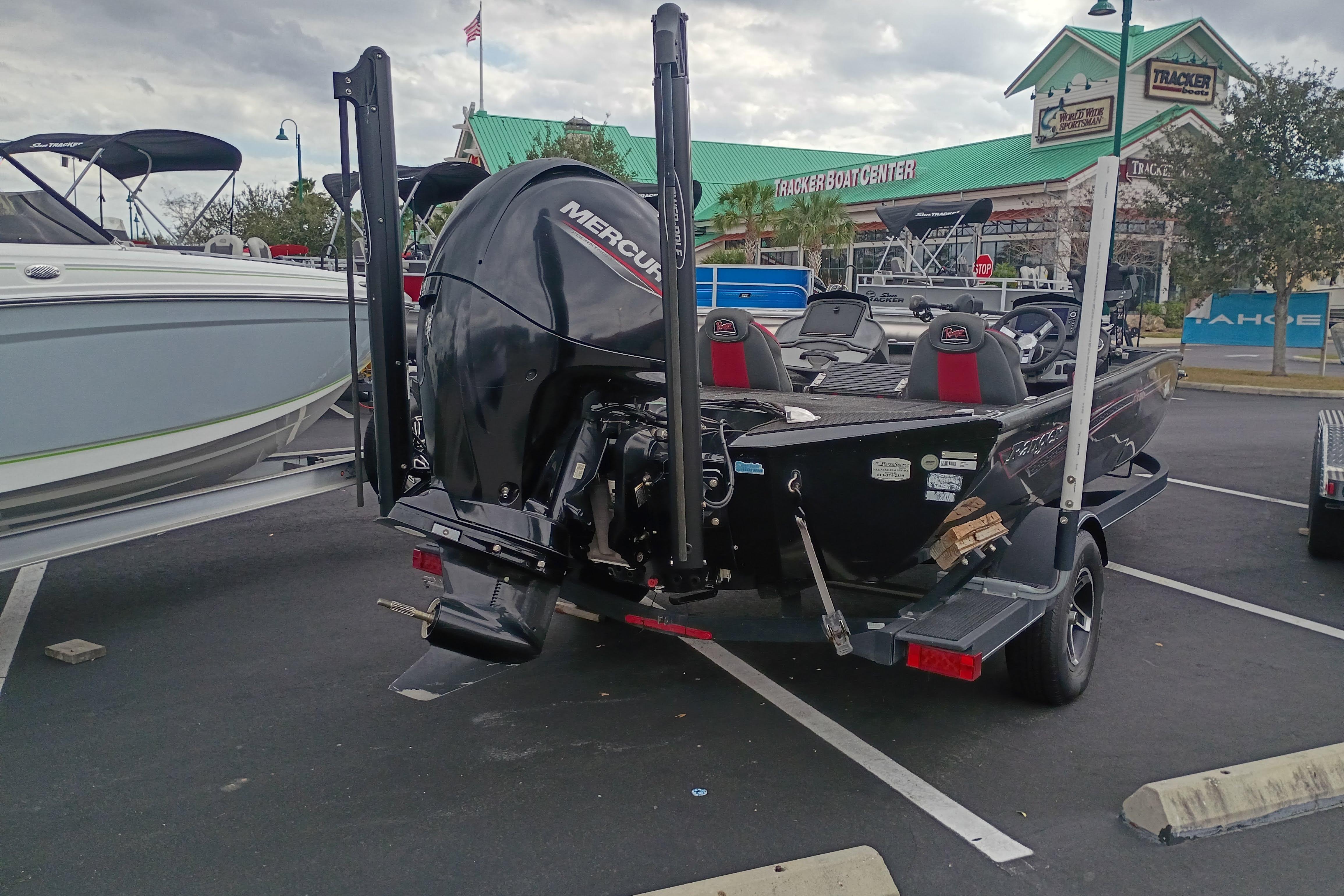 2021 Ranger RT198P boat with Mercury engine at Tracker Boat Center parking lot.