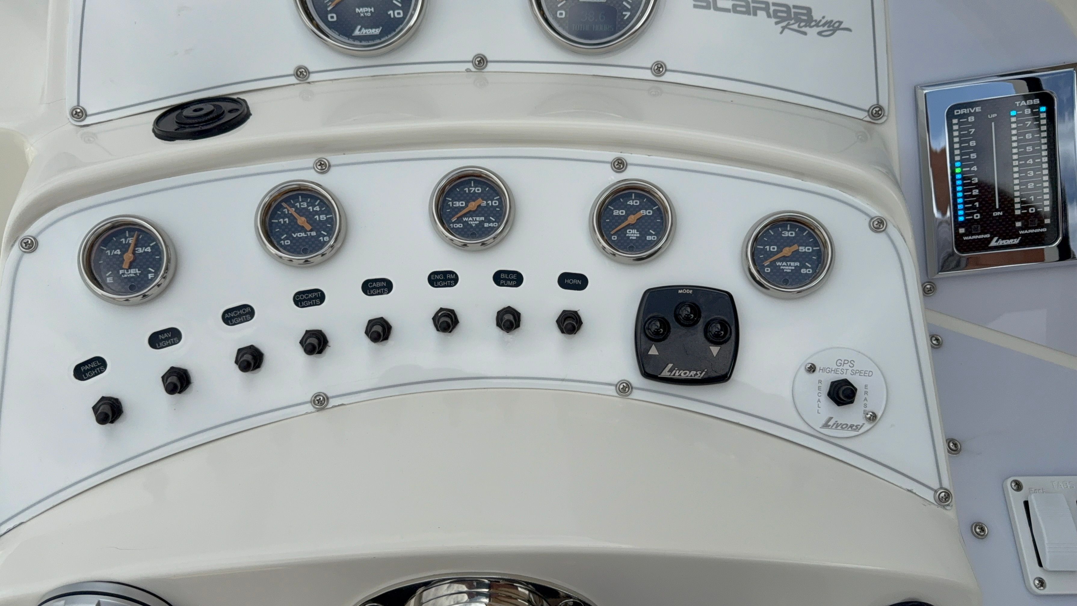 Dashboard of a 2001 Wellcraft 29 Scarab boat with instruments.