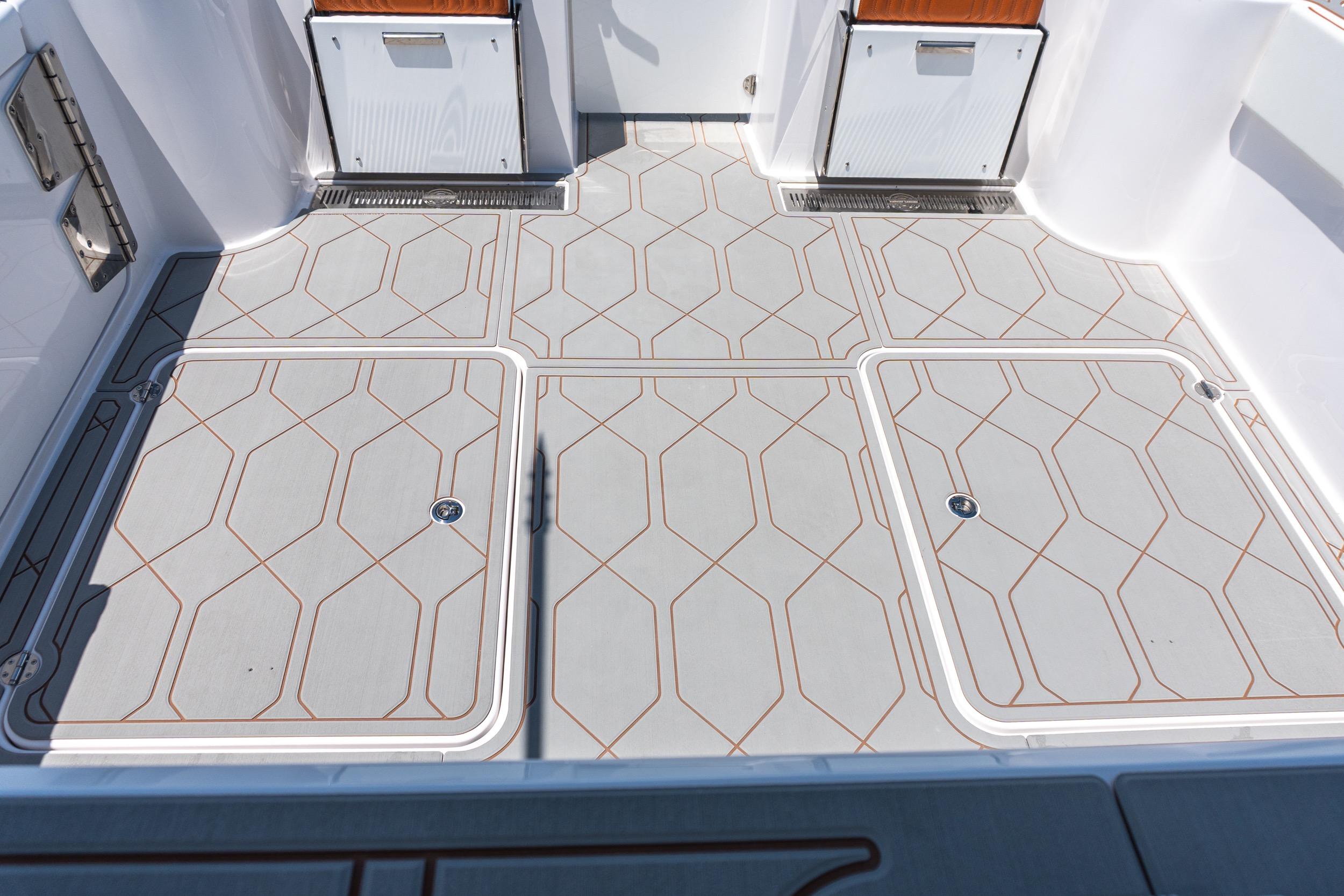 Deck of 2026 Twin Vee 400 GFX2 CC boat with geometric pattern flooring.