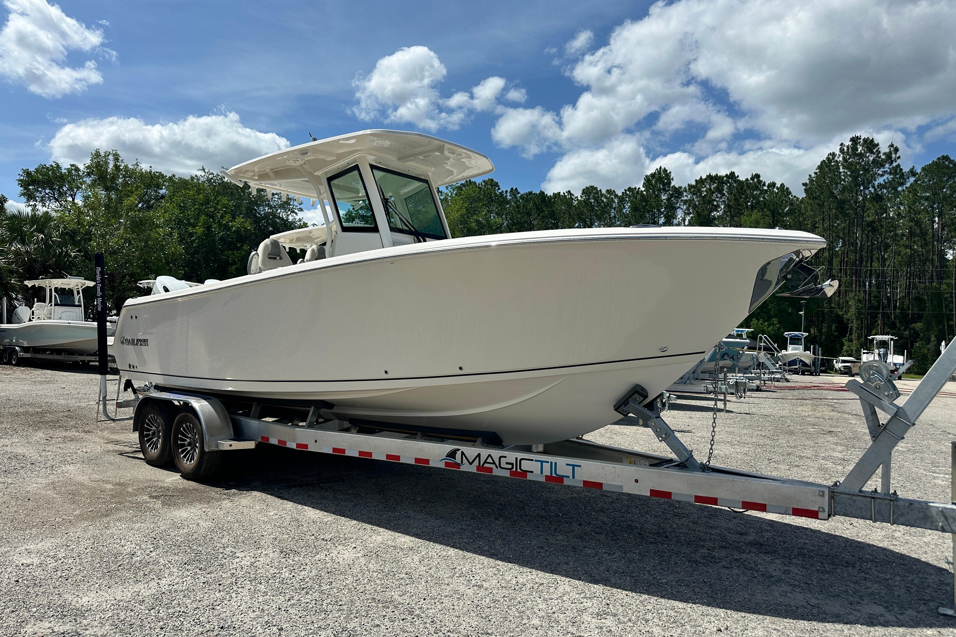 2026 Sailfish 272 CC boat on trailer under blue sky.
