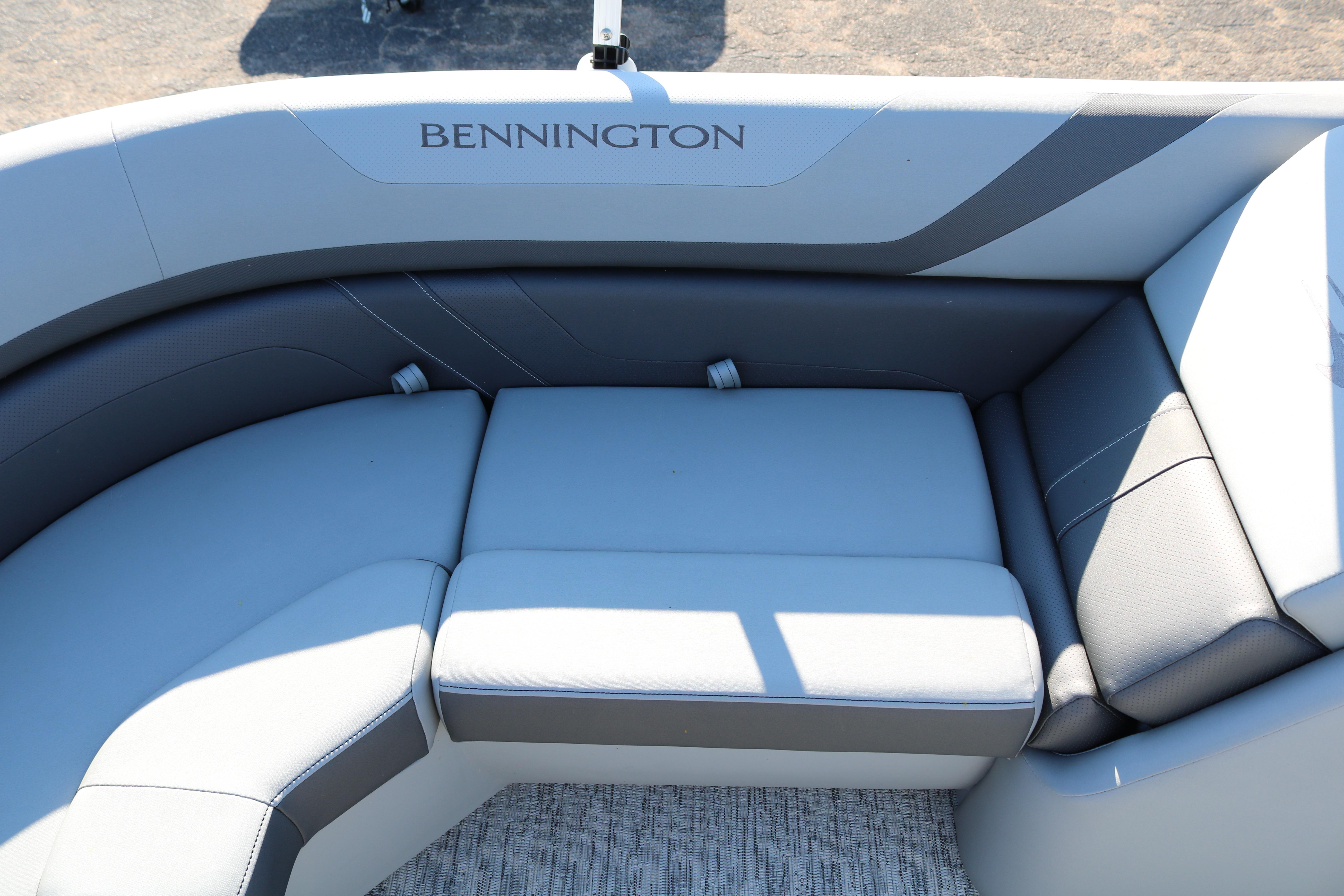 Bennington 22SX Stern Radius 2026 boat interior with gray cushioned seating.