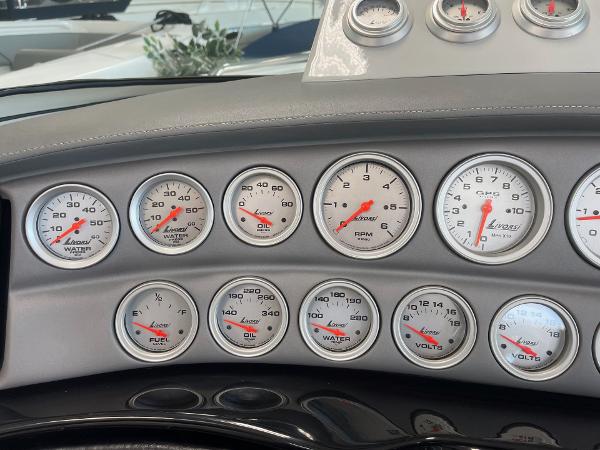 Dashboard of a 2005 Cobalt 343 boat with multiple gauges and dials.