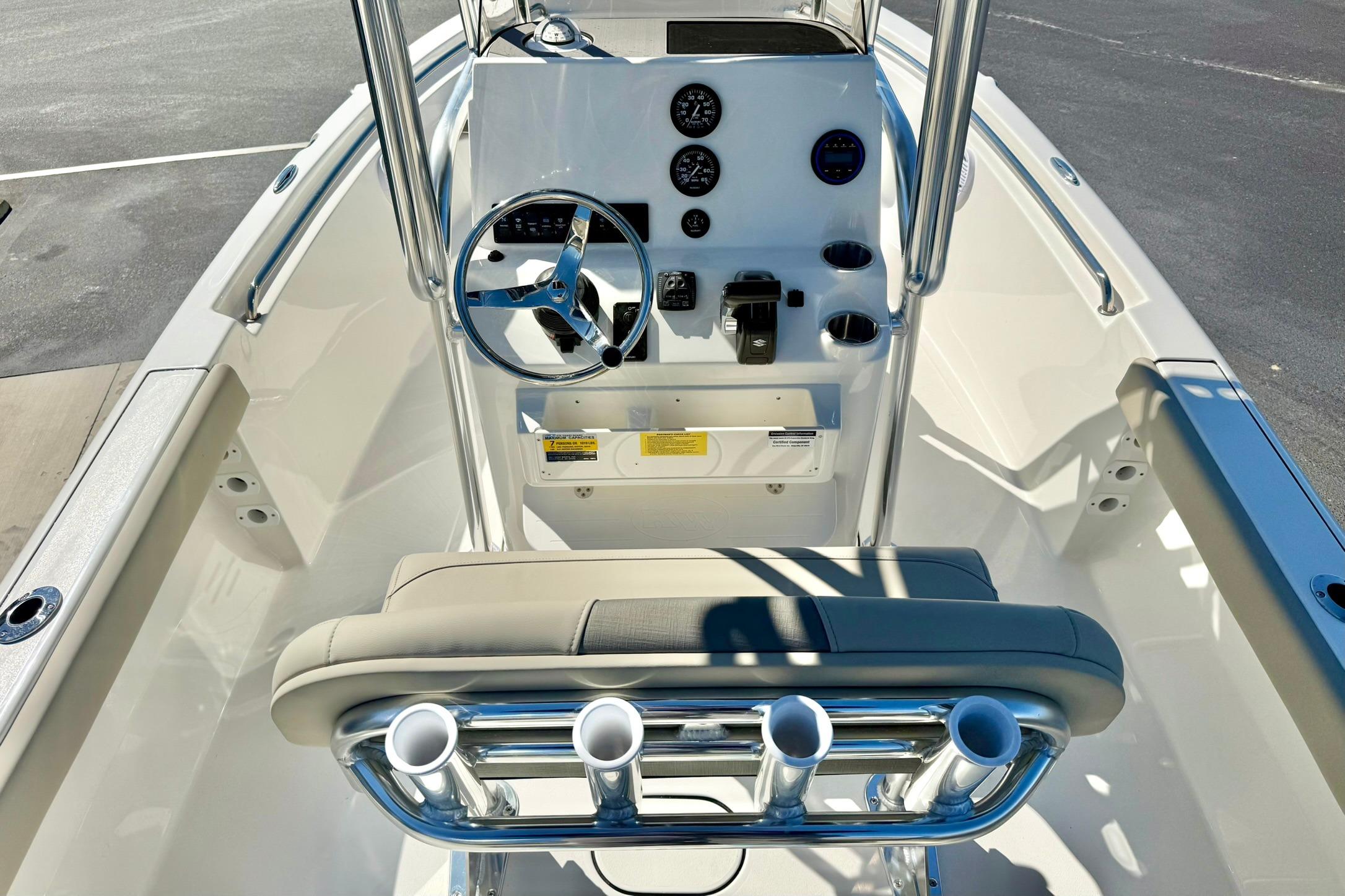 2026 Key West 189 FS boat interior with steering wheel and control panel.