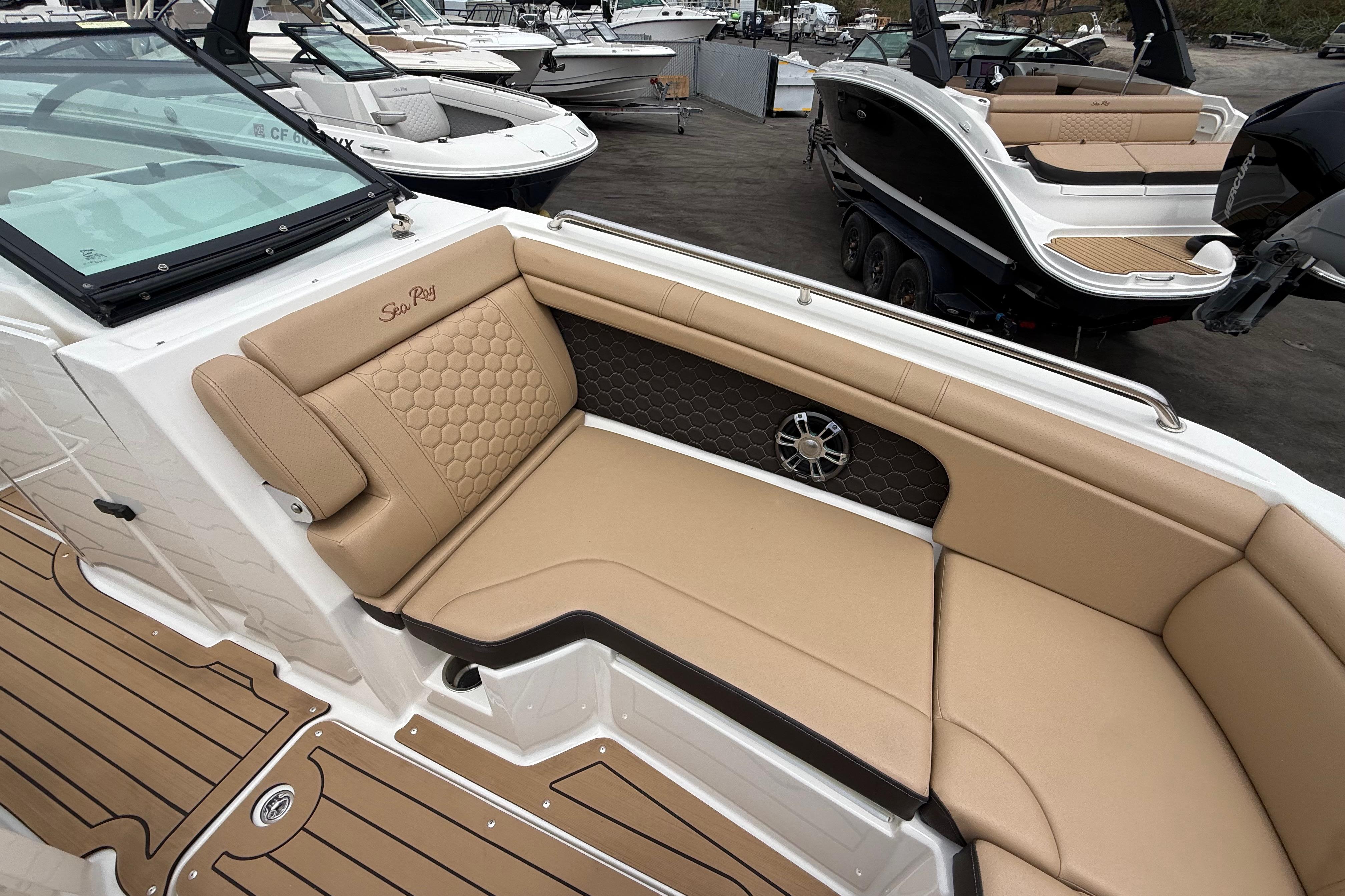2022 Sea Ray SDX 290 Outboard boat with luxurious tan seating and sleek design.