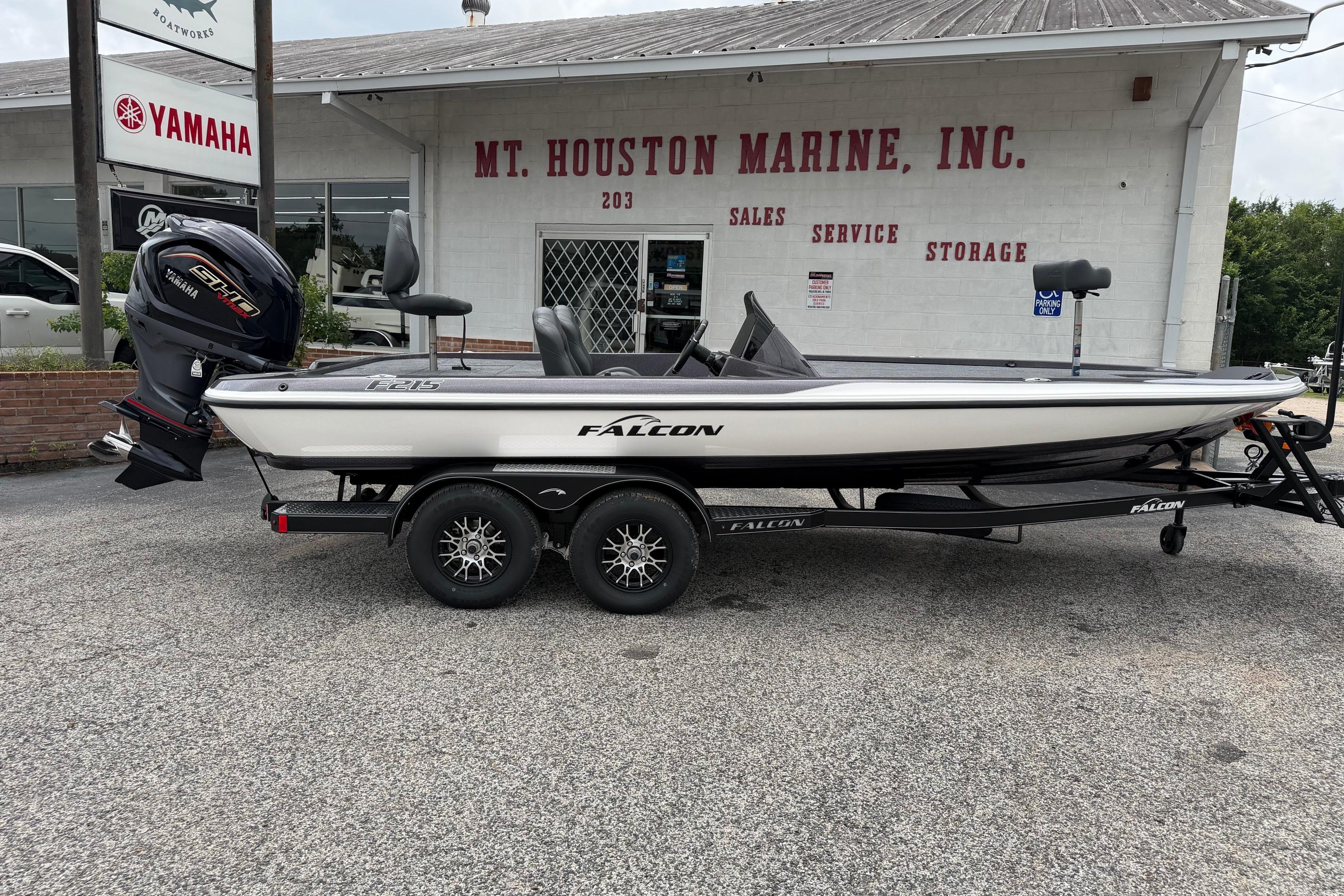 2027 Falcon Boats F215 on trailer at Mt. Houston Marine, Yamaha engine visible.