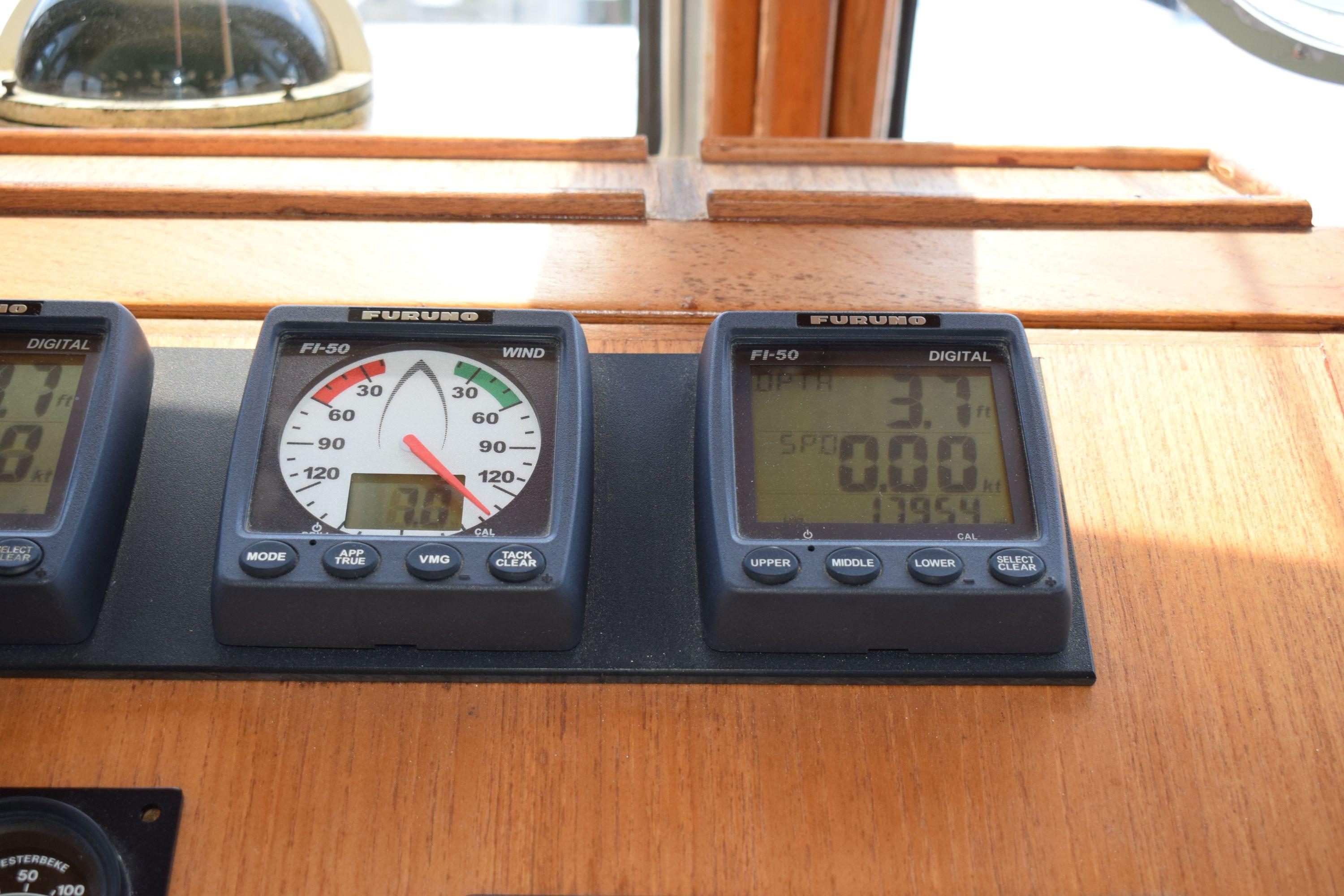 Furuno digital displays on 1980 Cheoy Lee 52 Motorsailer dashboard.
