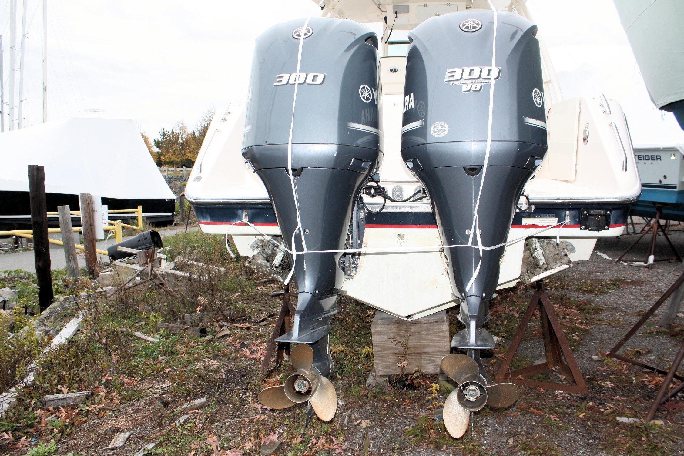 2013 Pursuit ST 310 Sport boat with dual Yamaha 300 V6 outboard engines.