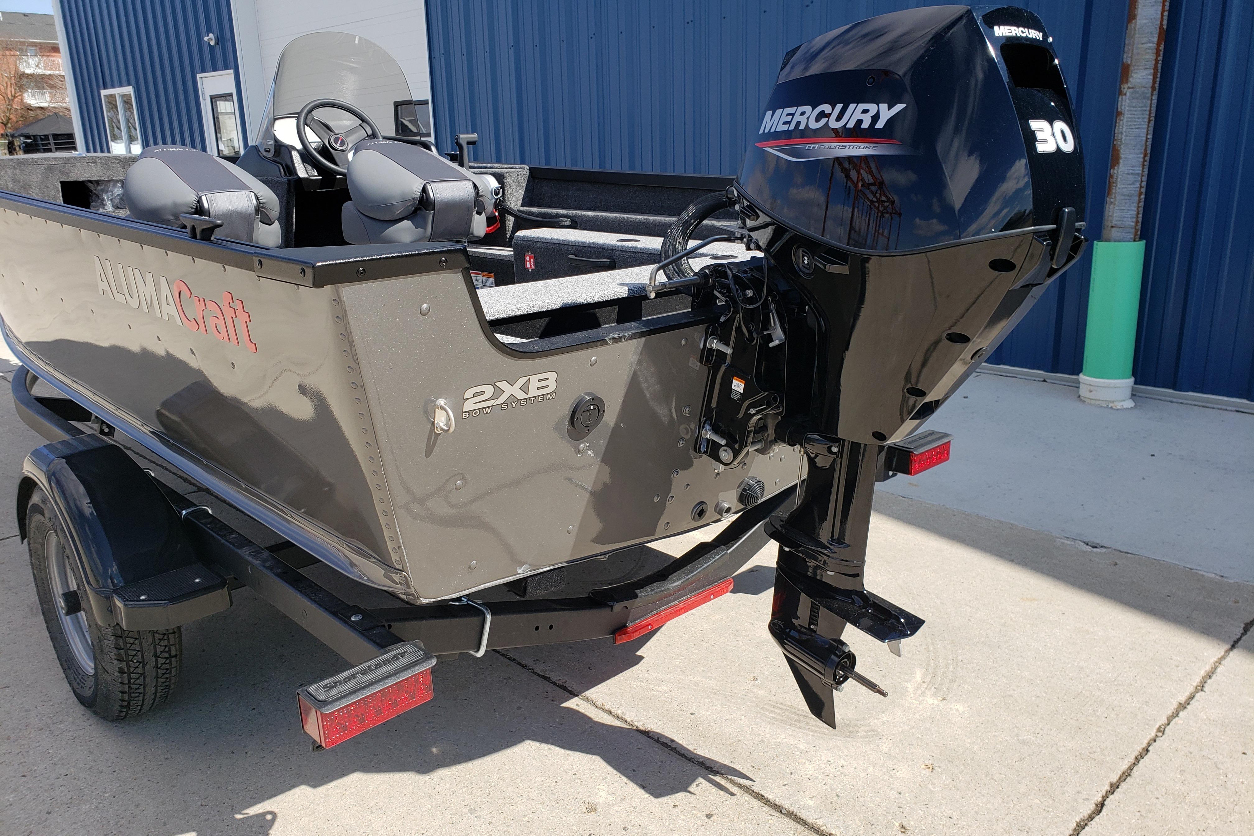 2026 Alumacraft Escape 165 CS boat with Mercury 30 outboard motor.