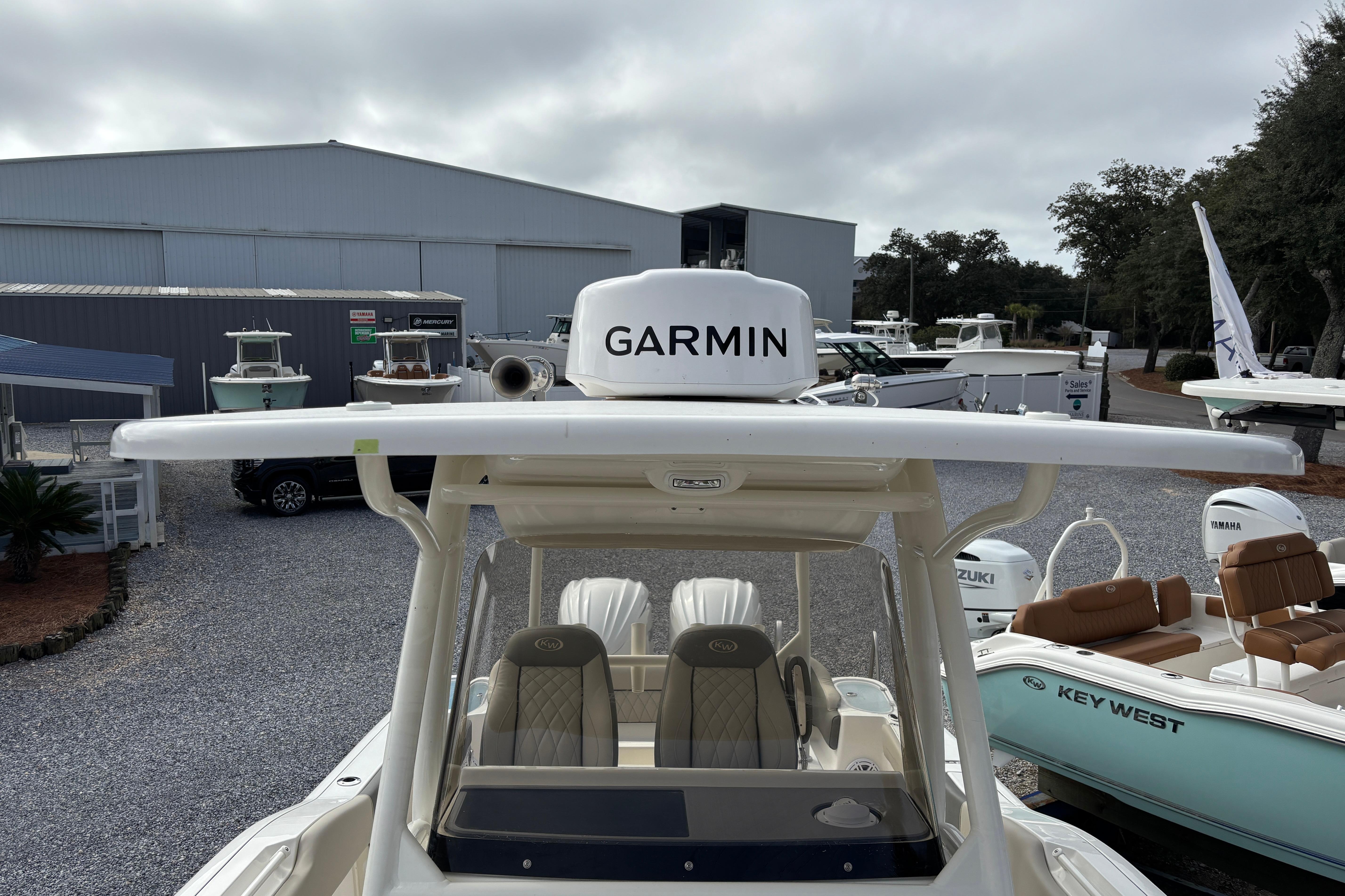 2026 Key West 263 FS boat with Garmin equipment, displayed at a dealership.