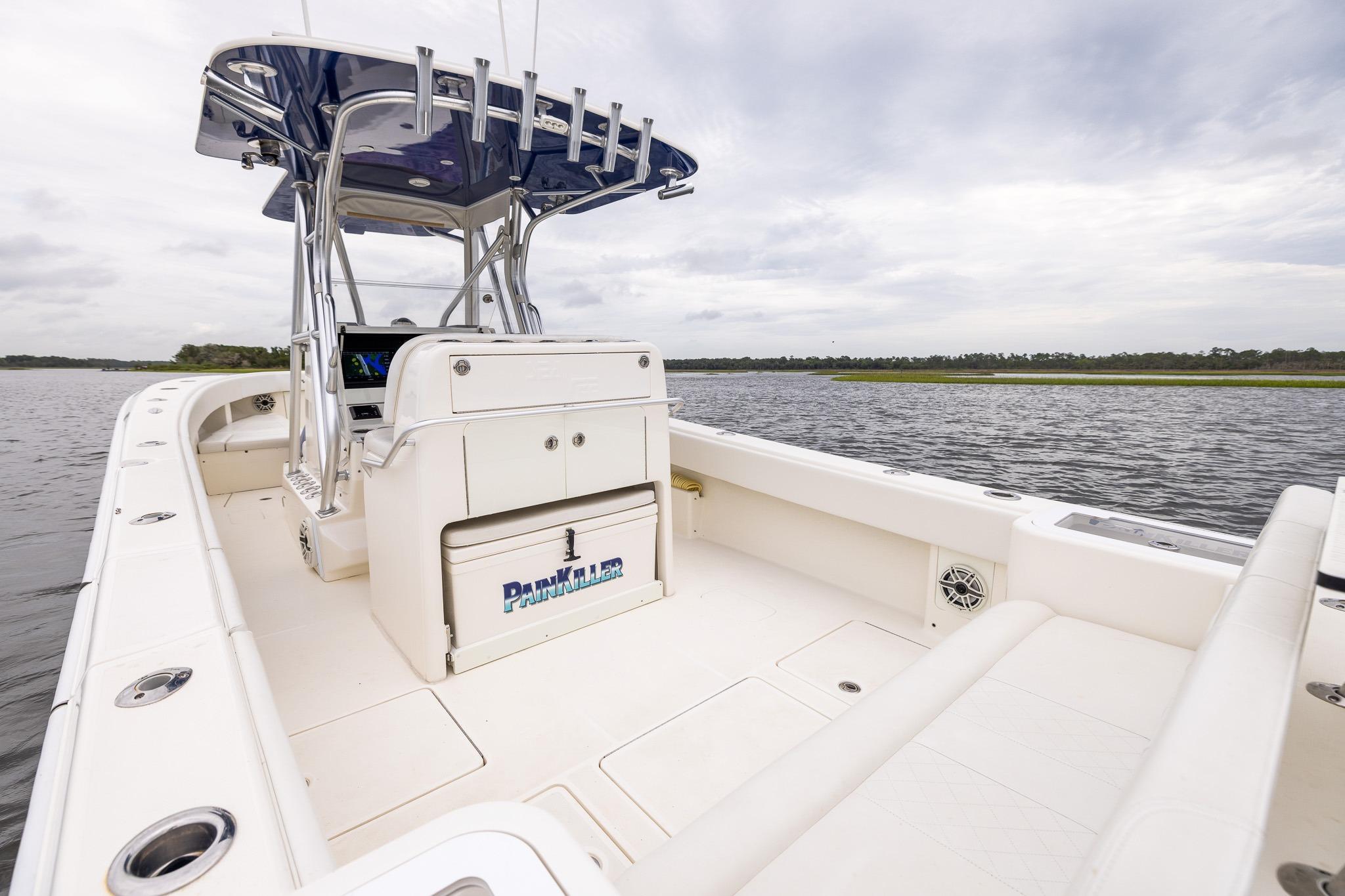 2019 SeaVee 322Z boat with spacious deck and modern console on calm waters.