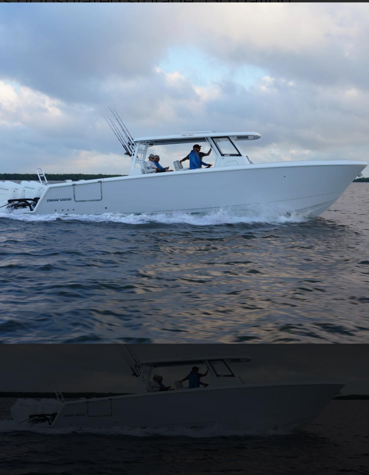 2025 Twin Vee 400 GFX boat cruising on open water.