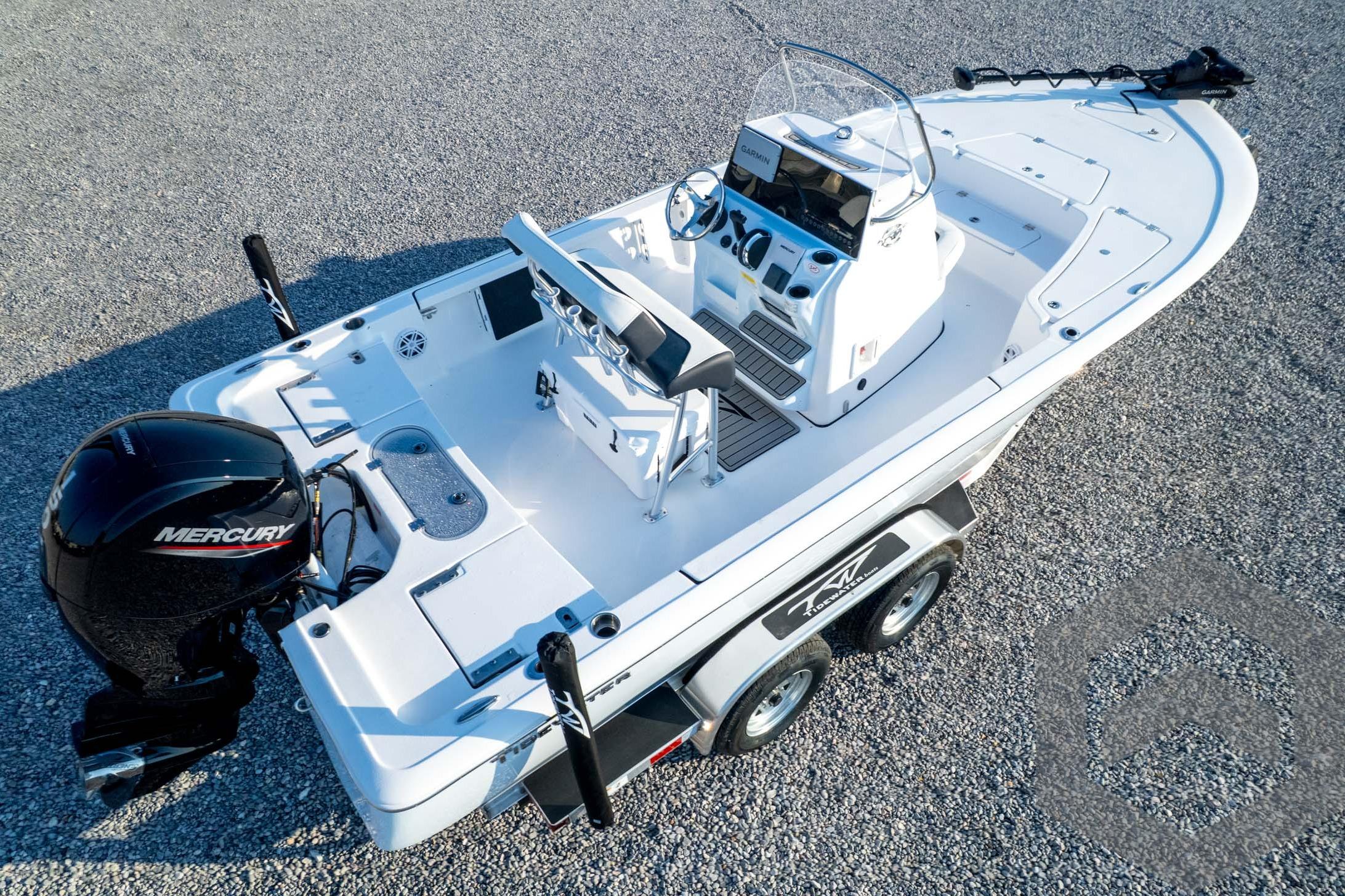 2026 Tidewater 2110 Bay Max boat with Mercury engine on a trailer.