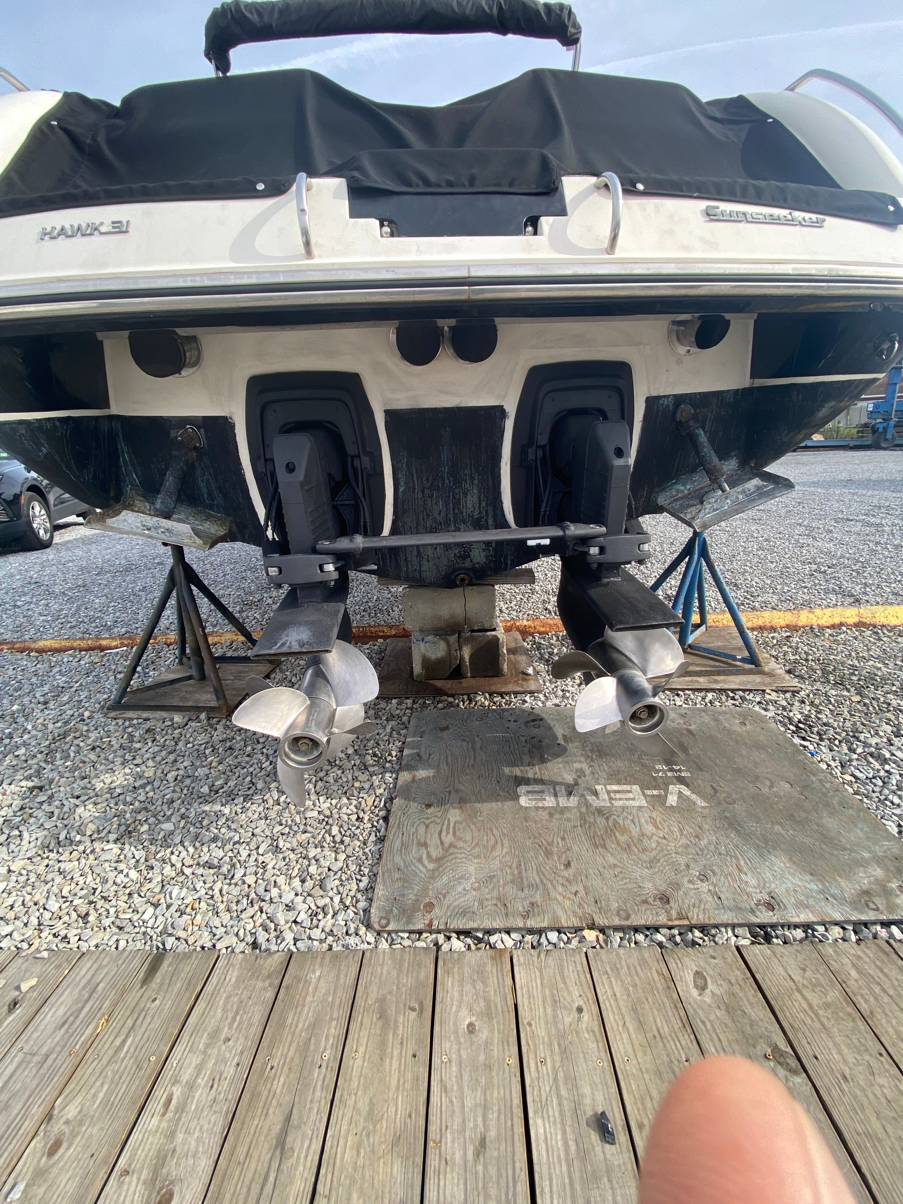 Rear view of a Sunseeker Hawk 31 boat on dry dock.