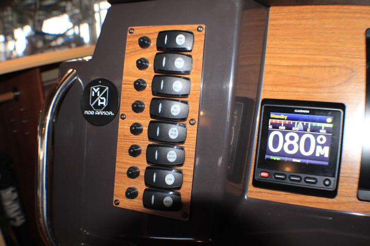 Control panel of 2020 Ranger Tugs R-27 with switches and Garmin display.