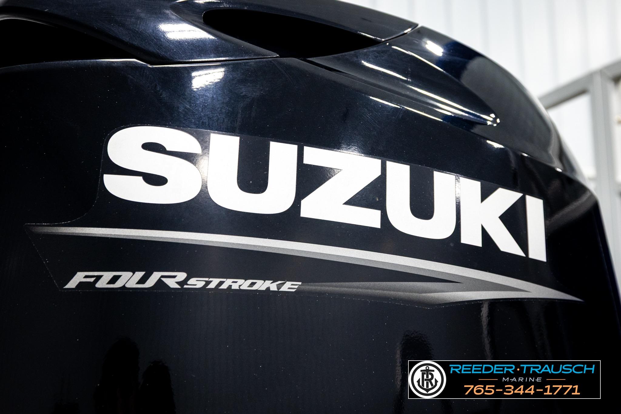 Suzuki Four Stroke engine on 2021 Bennington 20 SV boat, Reeder Trausch Marine logo.